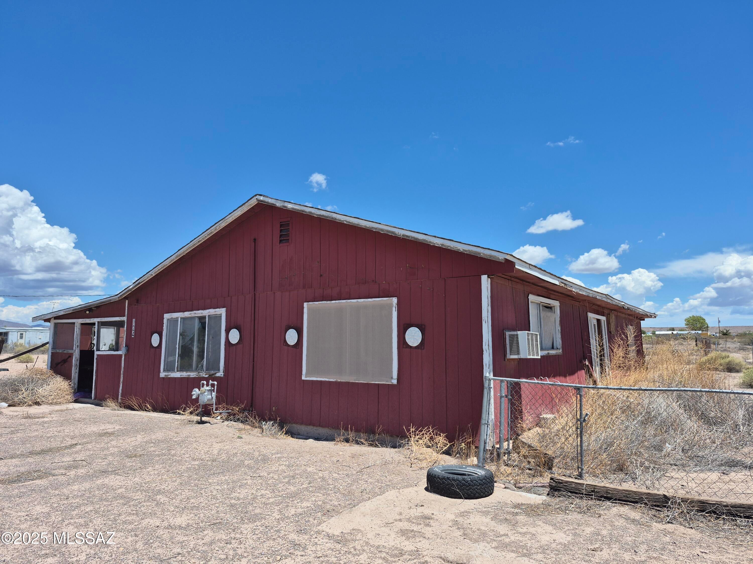 Investor special, cash only. 1 acre with a septic and a well, and electric and gas to the property. Slab foundation has cracking and sloping. Roof is sagging in areas. House has water damage from pipes that broke in the ceiling above the living room.