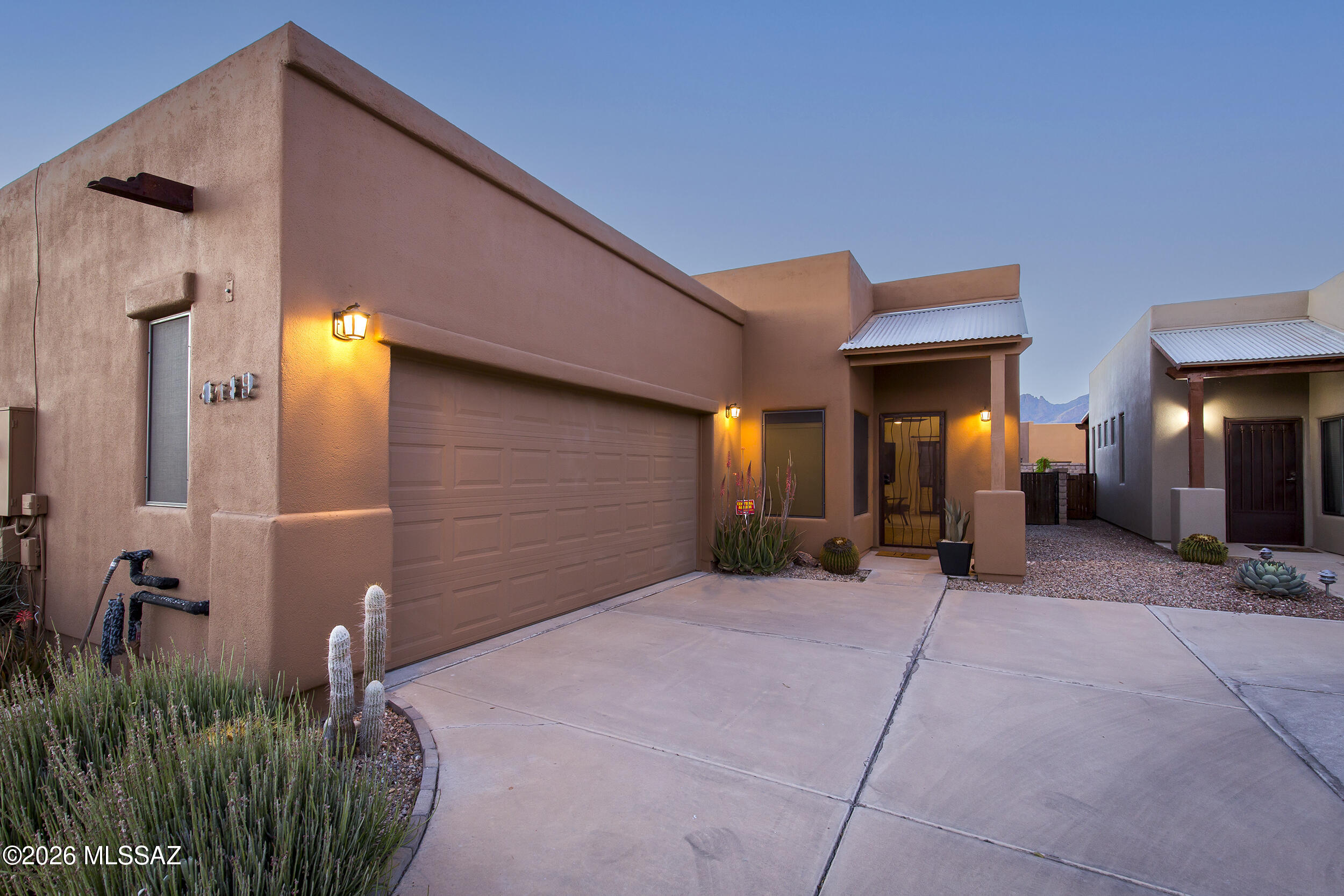 Full of charm, this inviting Southwestern-style home offers a bright, welcoming interior ready for you to come feel. Featuring a desirable split floorplan, the layout provides both comfort and privacy, perfect for everyday living or hosting guests. Recent updates and newly added backyard landscaping enhance the home's appeal, creating a relaxed outdoor space to enjoy Tucson's beautiful weather. The spacious two-car garage adds convenience, while the prime central location puts shopping, dining, and amenities within easy reach. Residents also enjoy access to a community pool and spa, adding to the lifestyle this home provides. Move-in ready and filled with warmth, this is a wonderful opportunity to own a thoughtfully refreshed home in a unique Tucson neighborhood.