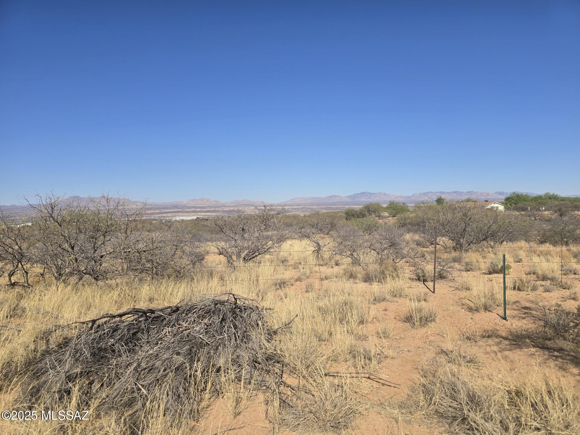 Fabulous views from this four acre lot. Ready for your dream home. City utilities at street. 
Taxes shown are for 15.17 acres that include a residence. Treasurer will re access taxes upon recordation of split and new purchase.