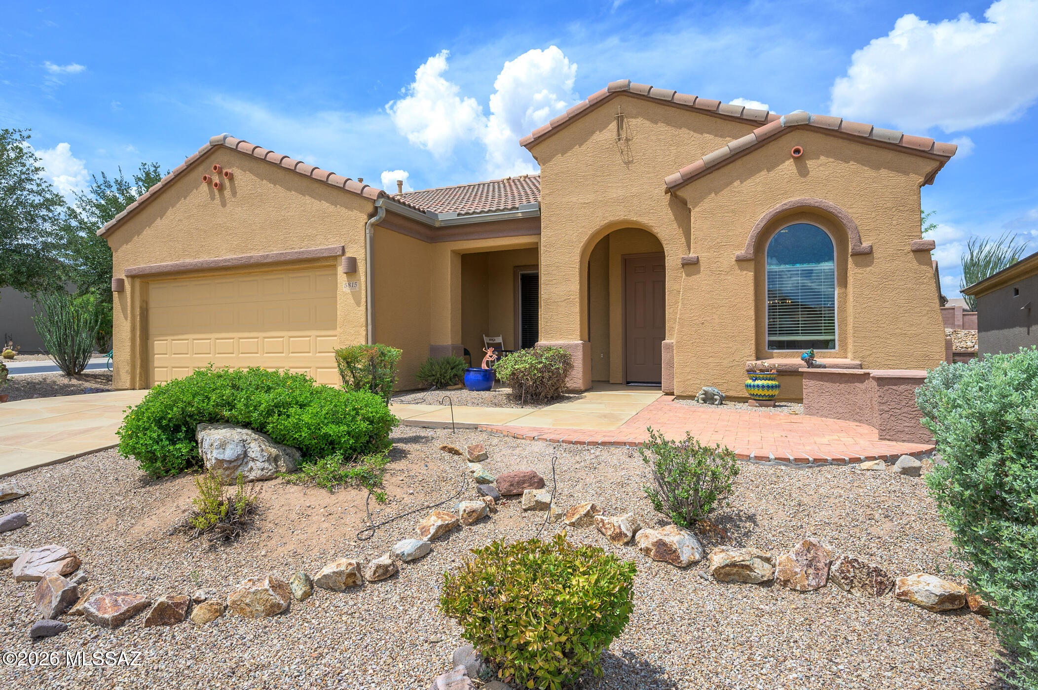 Welcome to this beautifully maintained Corner Lot, fully furnished and turnkey home in Canoa Ranch Terrace Gated community The seller has invested in numerous thoughtful upgrades, including a state-of-the-art, high-efficiency electric HVAC SYSTEM installed in 2026, Newer ROOF 2022, and an Electric SOLAR SHADE for the back patio--ideal for enjoying the outdoor space in comfort. Inside, the spacious two-bedroom, 2 bathroom home features a versatile third room that can serve as an office, den, or additional living area. The kitchen has been beautifully updated with acrylic countertops and newer  stainless-steel appliances. The spacious primary suite offers a private retreat with and ensuite bath and featuring dual sinks and a walk-in closet. The front guest bedroom captures breathtaking mountain view. Step outside to the beautifully landscaped private backyard, featuring, covered back patio with electric powered Solar shade,  paver walkway leading to a custom gas fire pit--an ideal setting for relaxing or entertaining. Raised garden beds provide the perfect space for growing vegetables, herbs, flowers, and more. Recent improvements include; Gas fire pit, exterior and interior Painted, Tile and carpet, decorative driveway has been re-Finished 2026, stainless steel appliances and Newer washer and dryer. Enjoy the many amenities and recreational opportunities available through GVR, Amenities included; Recreation Center, Pool, Pickleball, exercise facility, woodworking, Jewelry making, Pottery, Private Golf and Social Clubs..  If you're looking for a gated community, Mountain views, beautiful outdoor spaces, and a home that is truly move-in ready, this one is not to be missed!