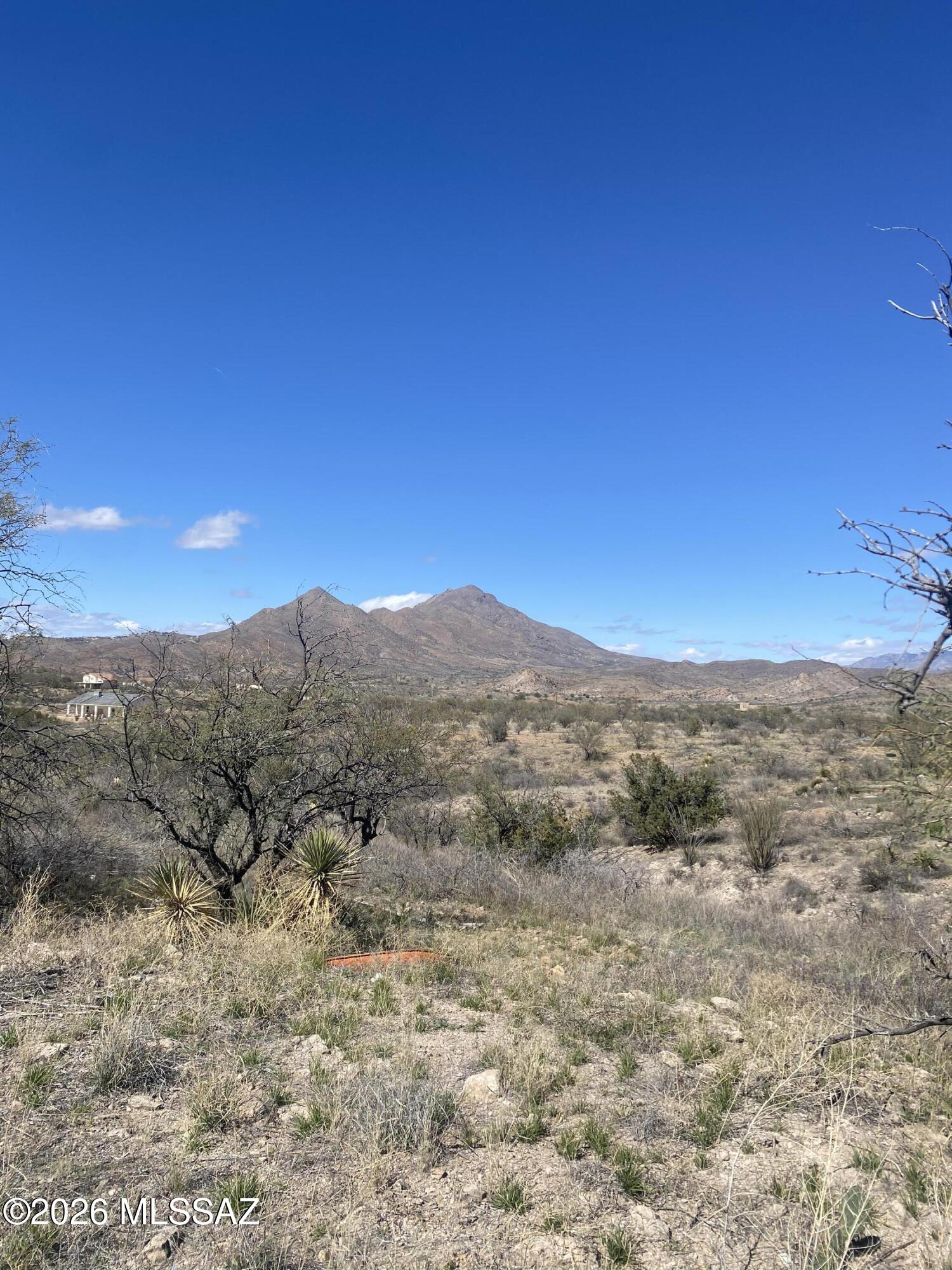 Nestled on a hill top with fantastic MOUNTAIN VIEWS, this is a very buildable lot with utilities at the road.