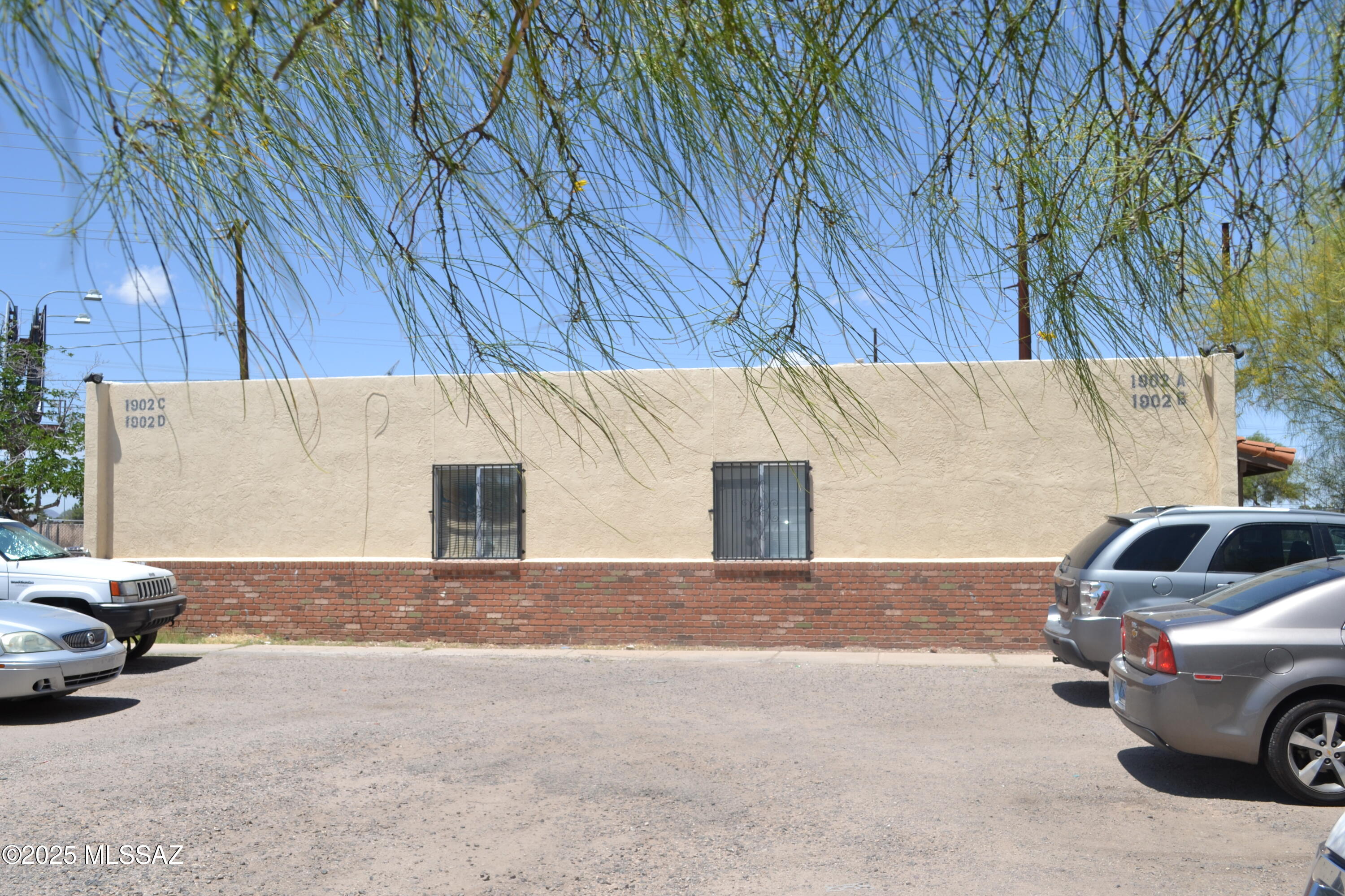 Great space and affordable living, this 2 bedroom, 2 bath, all tiled floors, a/c, 2 parking spaces with property completely fenced for privacy and security.  Must carry Renter's insurance and this is a NO PET PROPERTY.  Water, sewer and trash included.
