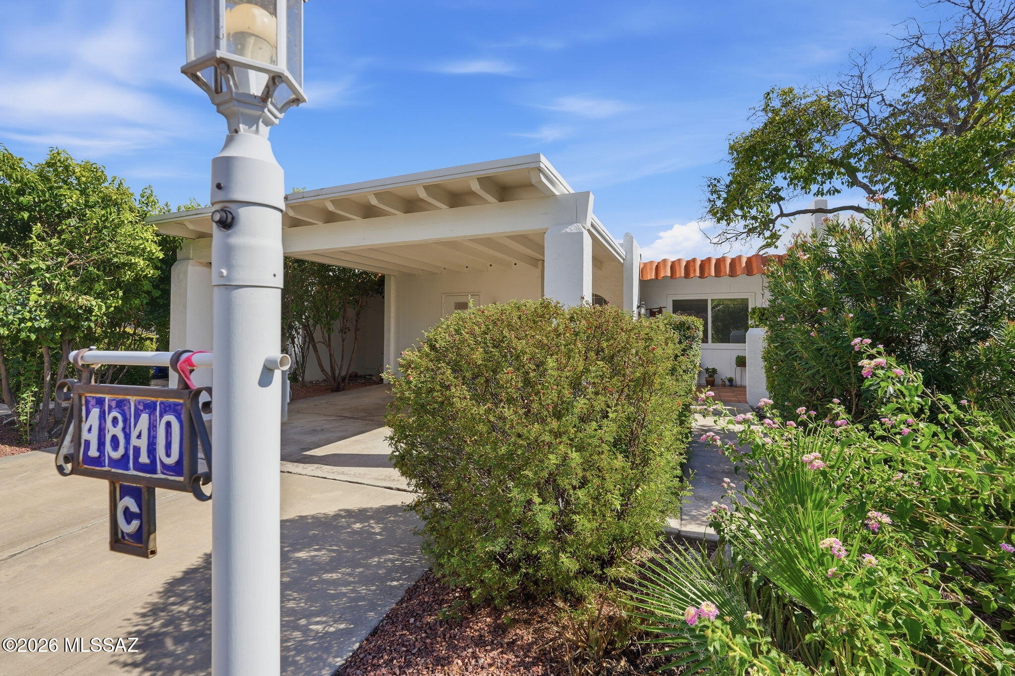 Located in the historic Old Fort Lowell neighborhood, this charming two-bedroom, 1¾-bath home offers a wonderful blend of character and thoughtful updates. The updated kitchen features maple cabinetry, quartz countertops, a pantry, and a convenient office/flex space just off the kitchen. Tile flooring, a gas fireplace, and a solar tube in the living room add comfort and natural light throughout the home.
Recent improvements include Anderson windows, new skylights, a new roof coating, & newer HVAC. Outdoors, enjoy a private, fully fenced backyard with a brick patio and drip irrigation--perfect for relaxing or entertaining. Plus the community pool & cabana located just out your gate. Additional features include a two-car carport and a desirable location close to historic San Pedro Chapel.