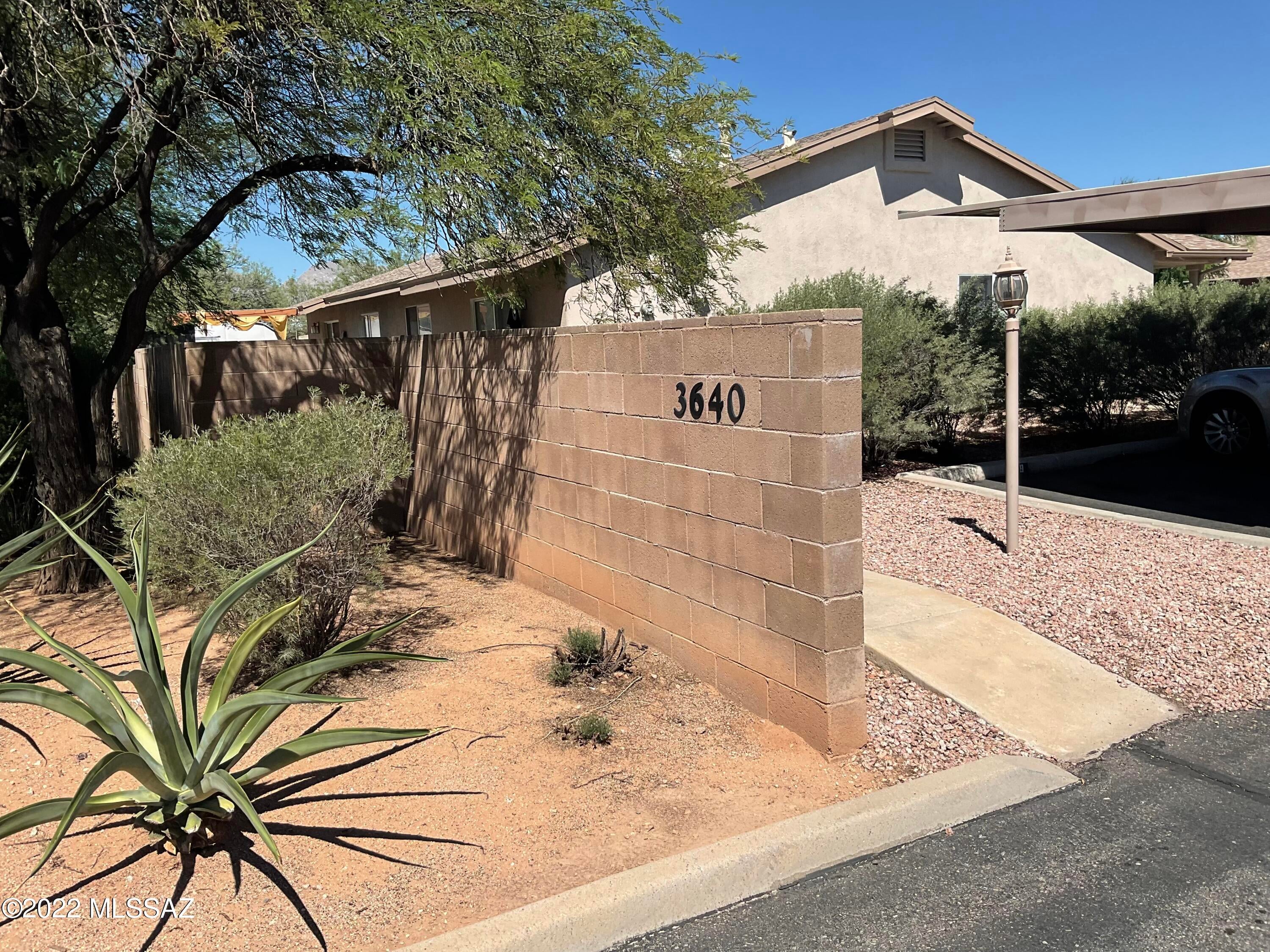 Cute condo close to University Of Arizona. Located at the U of A bike path . Open floor plan with vaulted ceilings. Two bedrooms and tow bathrooms. Kitchen has breakfast bar and pantry. Separate laundry room. End unit with large yard. Carport. Tenant occupied until 10/31/2026