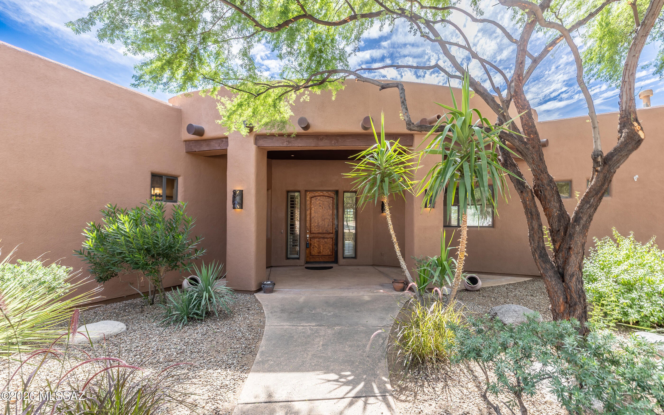 REMODELED 2021-2022. Lovely great room floorplan, custom cabinetry entertainment system-TV's convey. 3BRs plus LG. 14'8''x14' den & private 10'11''x10'5'' sitting room/library. Home bosts of 3 baths; powder room; plantation shutters; security; pool/spa solar coils for efficient heating; zoned HVACs & water heaters; 3 Gar; fabulous state of the art kithcen w/Samsung Frig; Red Wolf gas stove/oven; Avantium Oven/Microwave; Bosch DW; Brazilian Stone countertops w/leather finish; retractable mixer cabinet; super susan corner cabinet storage; under cabinet electrical strip w/2 charging ports at each end. Primary suite has stiing rm; large walk-in closet; heated bathroom floor; soaking tub; walk-in shower; bath vanities have auto built-in entry Sensor Lights(motion-activated) that provides soft g