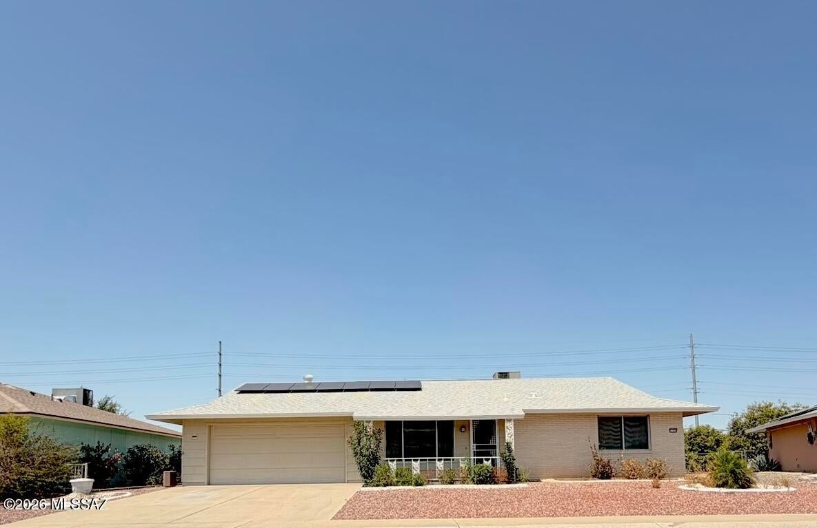 Welcome to your new home in Sun City!With modern updates throughout this 2 bedroom 2 bathroom home is definitely the one to see!From modern kitchen updates, fresh paint to new carpet throughout & all appliances included this home is move in ready!The garage has a tandem space that has ac!Solar adds another valuable feature helping make Arizona's year round electricity demands more manageable.From low maintenance landscaping to brand new roof last year this is the one for you!You'll enjoy walking to Quail Run Golf Course & easy access to the all the amenities Sun City has to offer.Residents enjoy the amenities which include pools,fitness centers,rec centers,golf & so much more!Sellers will contribute toward the solar loan at close of escrow to help get the new owner started!