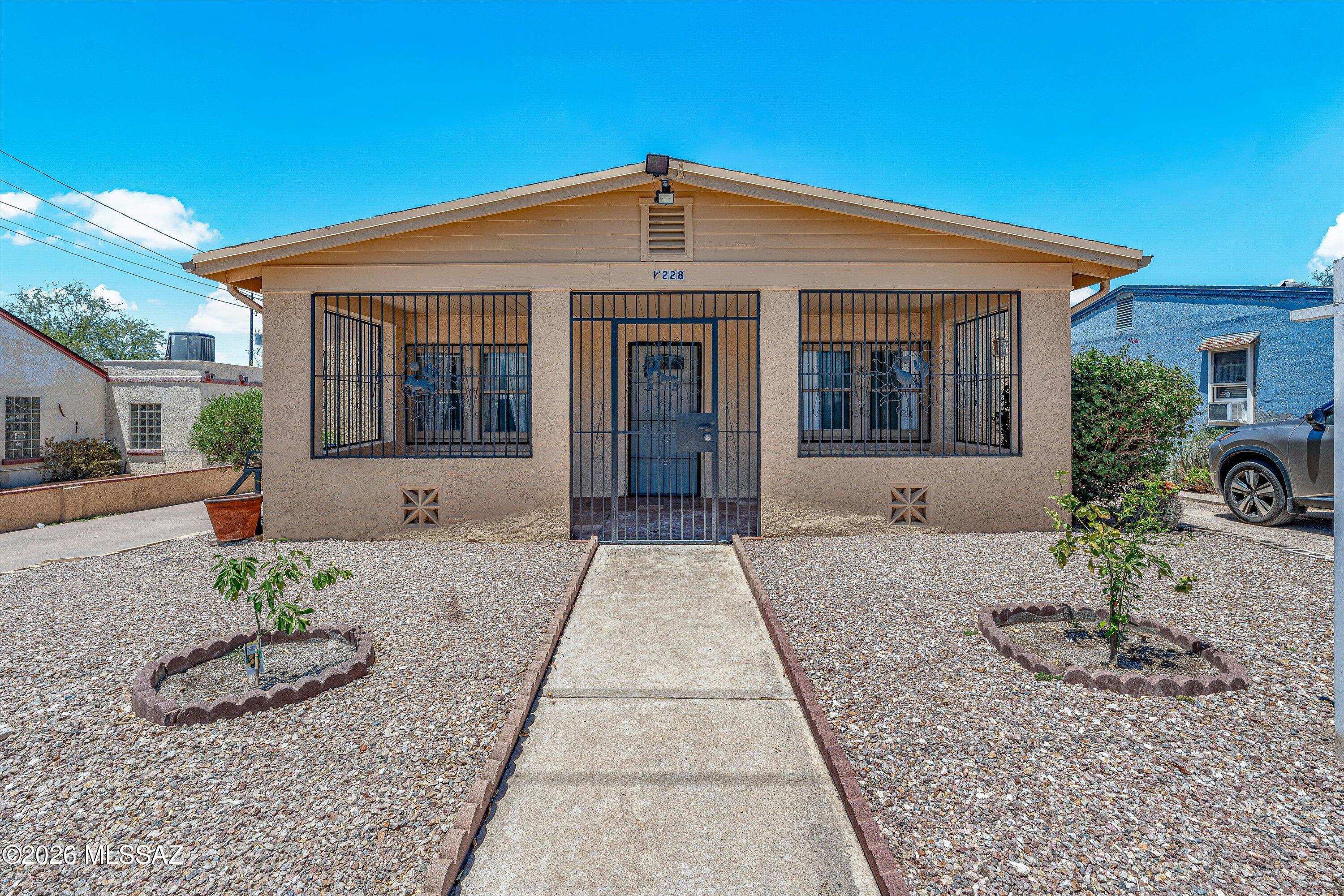Charming 1953 bungalow full of original character and potential! This 1,281 sq. ft. home features 3 bedrooms, 1 bath, a cozy fireplace, and an enclosed Arizona room perfect for relaxing year-round. Situated on a 6,000 sq. ft. lot, the property also includes an approximately 250 sq. ft. detached 1-bedroom, 1-bath guest house currently rented for $600/month, providing immediate income potential. Centrally located near shopping, dining, schools, and other conveniences. While the property could benefit from some TLC, it's an excellent opportunity for homeowners, investors, or anyone looking to add value. Don't miss this unique property offering two living spaces, vintage charm, and endless possibilities! Step back in time and discover the character and charm of this classic 1953 bungalow! Offering 1,281 sq. ft., this 3-bedroom, 1-bath home features many of its original details, a cozy fireplace, and the timeless appeal that makes vintage homes so special. Relax in the enclosed Arizona room/porch, the perfect spot to enjoy your morning coffee or unwind in the evening.

Situated on a 6,000 sq. ft. lot, the property also includes an approximately 250 sq. ft. detached guest house with 1 bedroom and 1 bathroom. Currently rented for $600 per month, it provides an excellent income-producing opportunity for investors or homeowners seeking supplemental income. The guest house is also ideal for extended family, guests, a home office, or studio space.

Conveniently located near shopping, dining, schools, and everyday amenities, this centrally located property offers incredible potential. While some TLC is needed, this is a rare opportunity to restore and personalize a home filled with original character while benefiting from an existing rental income stream. Don't miss your chance to own this unique property with two living spaces and endless possibilities.