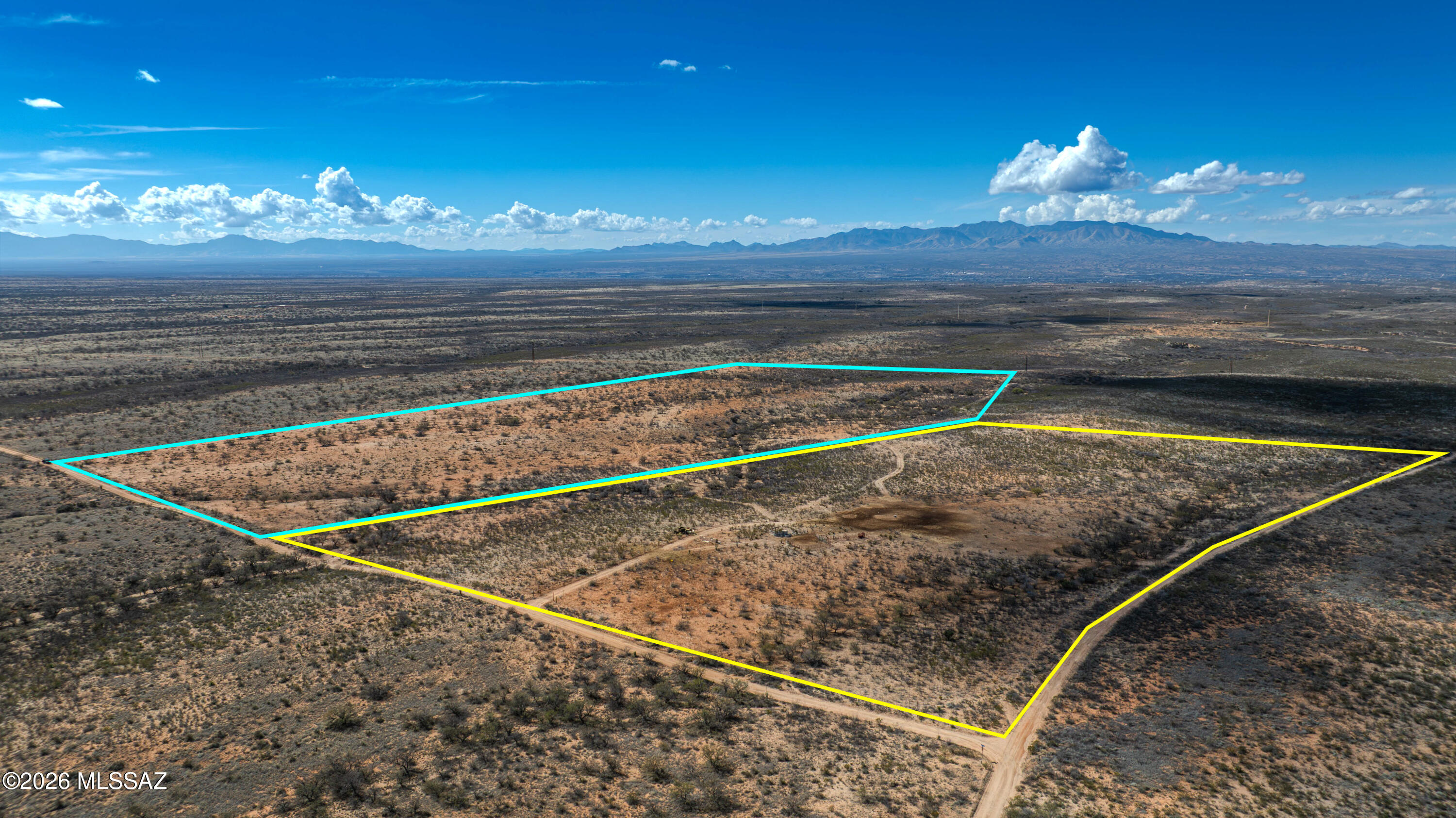 76 Acres with a Great Water Well with Solar Power, Septic and all 76 Acres are Fenced. Lot is located in the quiet part of the Ranch with Benson lights off in the distance at night. It has an established building pad close to the septic tank and the water well was recently updated to conform to the solar power. If you are considering building a house, this location takes the guess work out of drilling a well and establishing a septic, and it two lots sold together to give you 76 acres which is all fenced. This is a great opportunity.