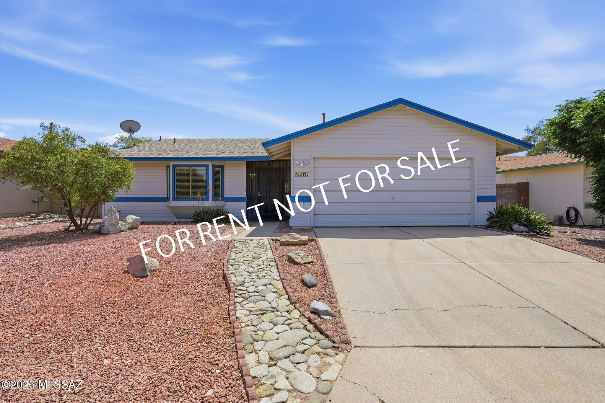 Built in 1986, this charming 2 BED 2 BATH 1066 SQ.FT home is located in the desirable Meadowbrook neighborhood in Northwest Tucson the home offers a functional layout with comfortable living spaces. The home features laminate flooring throughout, with tile in the kitchen and bathrooms. The kitchen offers crisp white cabinetry and stainless steel appliances. Appliances included: refrigerator, gas oven/stove, dishwasher, washer / dryer. The inviting living room features a cozy wood-burning fireplace. Enjoy spacious, light-filled bedrooms with abundant natural light. The primary suite includes a walk-in shower. Step outside to a low-maintenance backyard, perfect for relaxing and enjoying cool desert nights. Meadowbrook residents enjoy fantastic community amenities, including a sparkling pool and spa, a kiddie pool, ramadas with picnic tables, and a park featuring brand-new play equipment, a baseball field, basketball courts, and mature shade trees. Pets are subject to approval. 

**Please visit our website for SECURITY DEPOSIT AMOUNT AND OTHER FEES.**