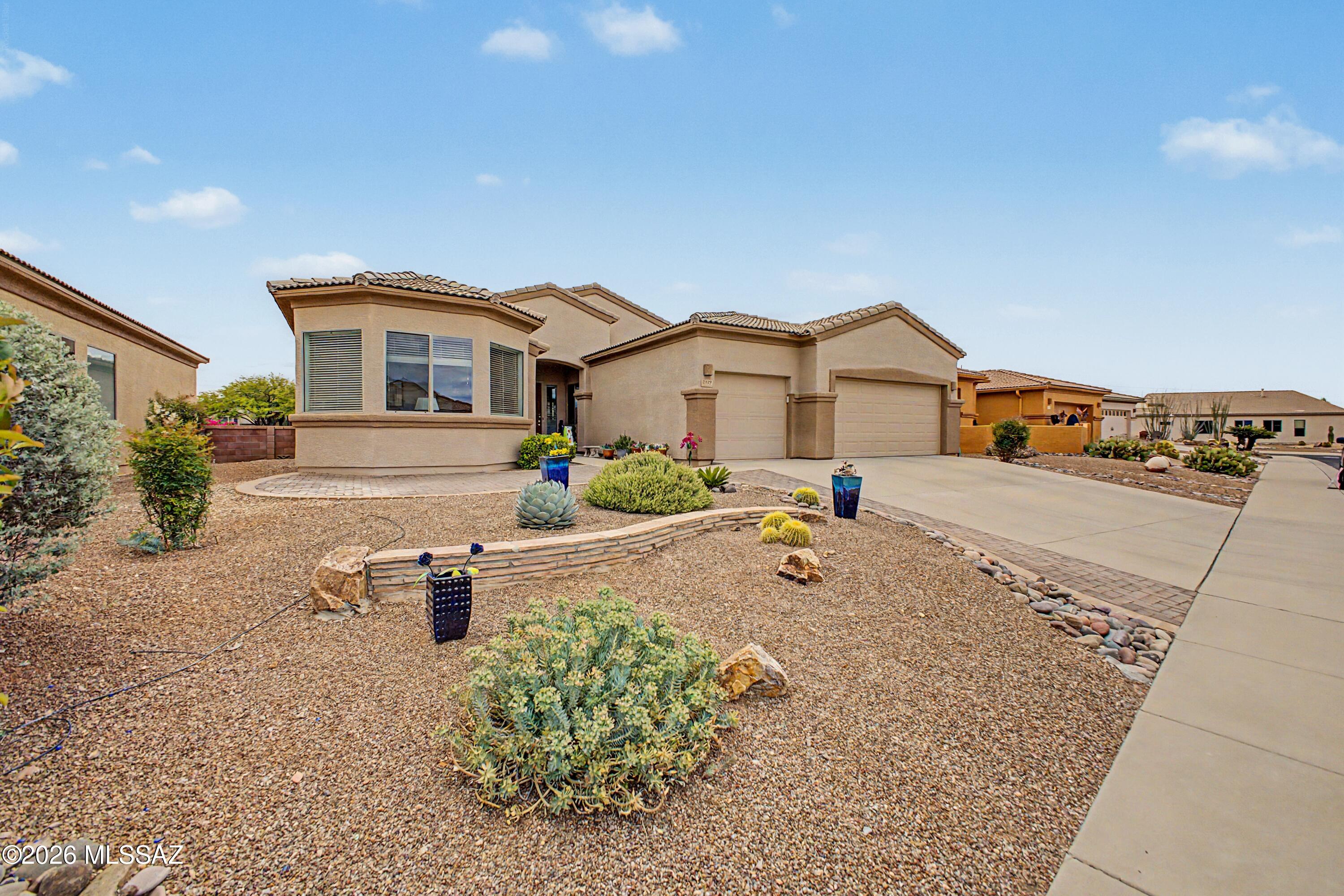 Welcome to your quiet, clean and wonderfully cared for Green Valley home.  Located at the top of the neighborhood away from freeway noise with great mountain views.  3 bed, 3 bath includes a den, private primary bedroom suite giving you space and your guests space to enjoy.  Storage is plentiful with a 3 car garage with shelving.  Newer low maintenance gun metal kitchen appliances are all included! Landscaping, potted plants, a veggie garden on a drip system also all included.  Home is covered by a home warranty and transferrable.  You're going to love it!!