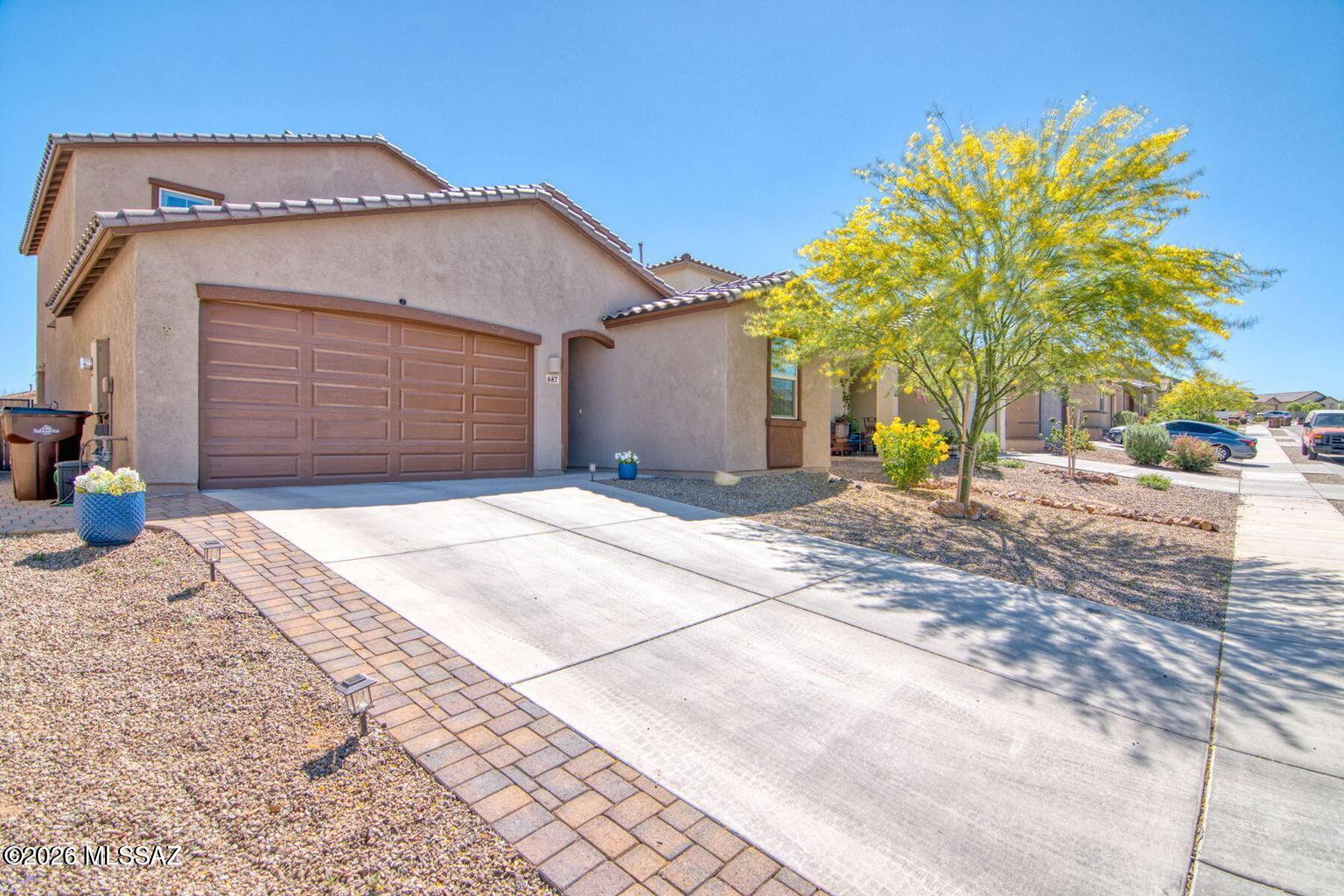 Beautiful next to new 4-bedroom, 3-bath home located in Sahuarita! This spacious home offers a modern, open layout with plenty of room to live, work, and relax. The versatile bonus space is perfect for a home office, playroom, or additional living area to fit your needs. The kitchen comes fully equipped with appliances and opens seamlessly to the main living area, making everyday living and entertaining easy. Step outside to a low-maintenance backyard featuring an extended patio and turf--perfect for enjoying Arizona evenings. With no direct rear neighbors, you'll have added privacy and peaceful desert views. Washer and dryer hookups available. Enjoy access to great community amenities, including a pool. Pets are welcome. Owner reserves the right to approve or deny pets based on quantity,