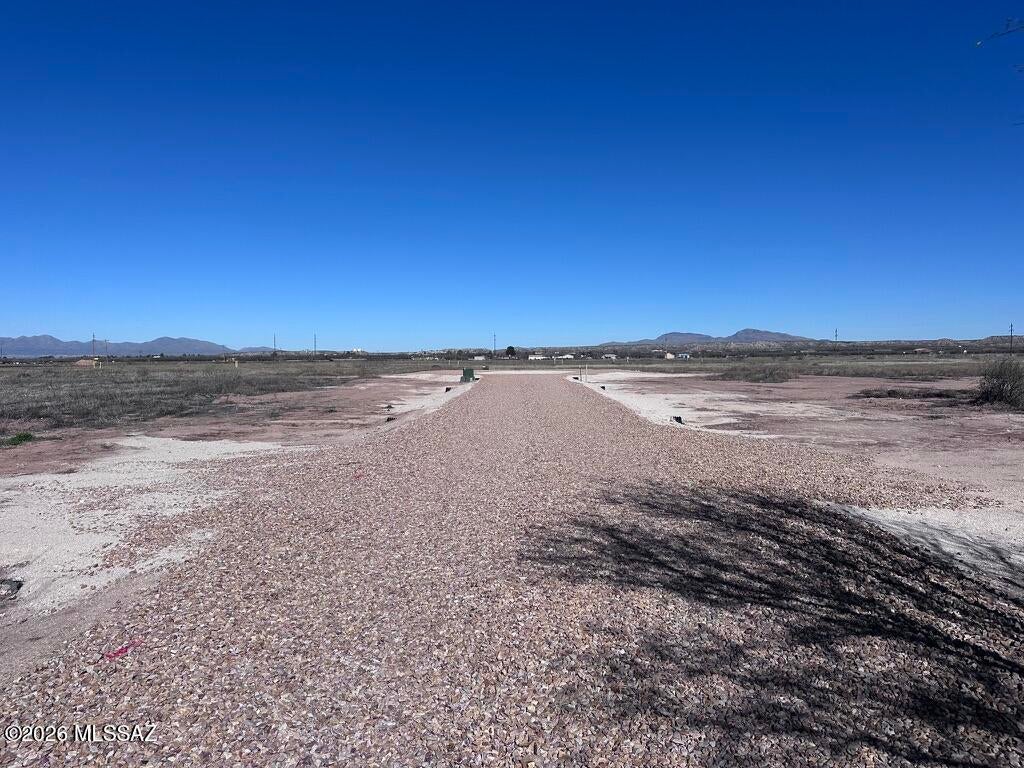 *LOT B* Rare opportunity to own acreage in the quiet Pomerene area, offering excellent potential for custom home construction or a small builder/investment project. These five lots are located on a developed cul-de-sac just off Colony Road, providing privacy, functionality, and an efficient layout. Electric and water are available to the lot lines, reducing upfront development costs. Access is provided by a gravel road, and a new survey has been completed. Tax records currently reflect the original parcel and do not yet show the recent lot configuration. Whether you are looking to build a thoughtfully designed custom home or capitalize on a multi-lot opportunity for future homes, this property offers flexibility, open space, and peaceful rural surroundings with convenient access to town.