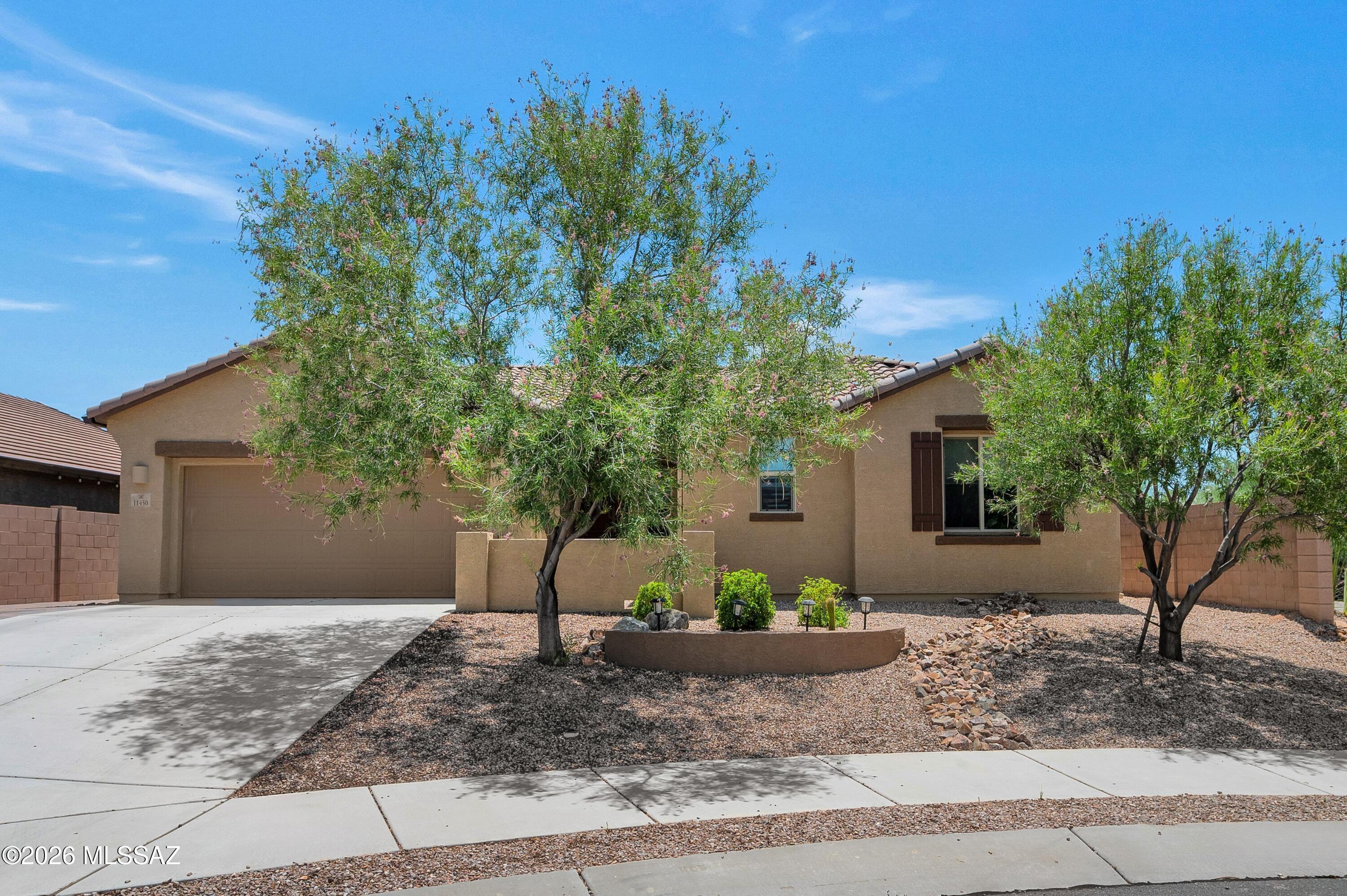 Beautiful home located on larger lot with common area. Gated courtyard entry,. Home features premium upgrades, throughout. Large family room overlooking the patio, gorgeous kitchen with granite counters, premium GE profile. Appliances with stunning stove, two pantries. Large master bedroom with stunning bathroom that features marble, dual vanity and extra-large shower, and 
walk in closet. Floors are tiled except bedrooms. Back patio with extended brick patio pavers, landscaped with 2 water storage. See list of upgrades. Seller to credit the buyer $2000.00 to use for closing costs or to buy down the interest
rate at closing, with am excepted contract