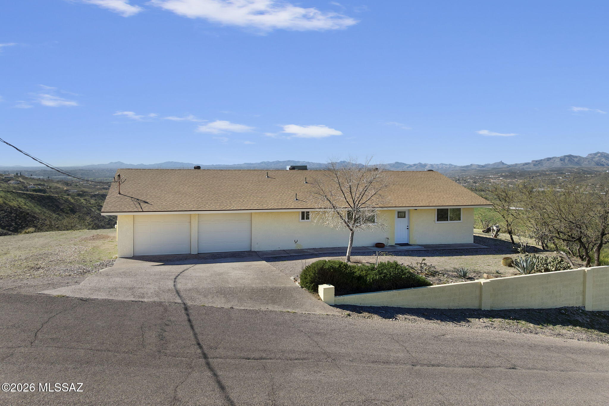 293 Calle Cappela sits on 2.82 acres with stunning panoramic views, this beautifully maintained 2 bedroom, 2 bath home offers the perfect blend of comfort, and space. With 1,421 square feet and an open floor plan, the home features a spacious living and dining area that creates a warm and inviting atmosphere for everyday use and entertaining.

The kitchen is thoughtfully designed with a large island and a walk-in pantry, providing plenty of storage and workspace. The home also features updated flooring and has been recently painted on the interior, giving it a fresh and modern feel.

Both bedrooms are generously sized, offering comfort and flexibility. Step outside to the extended covered patio, where you can relax and take in the beautiful views that surround the property.