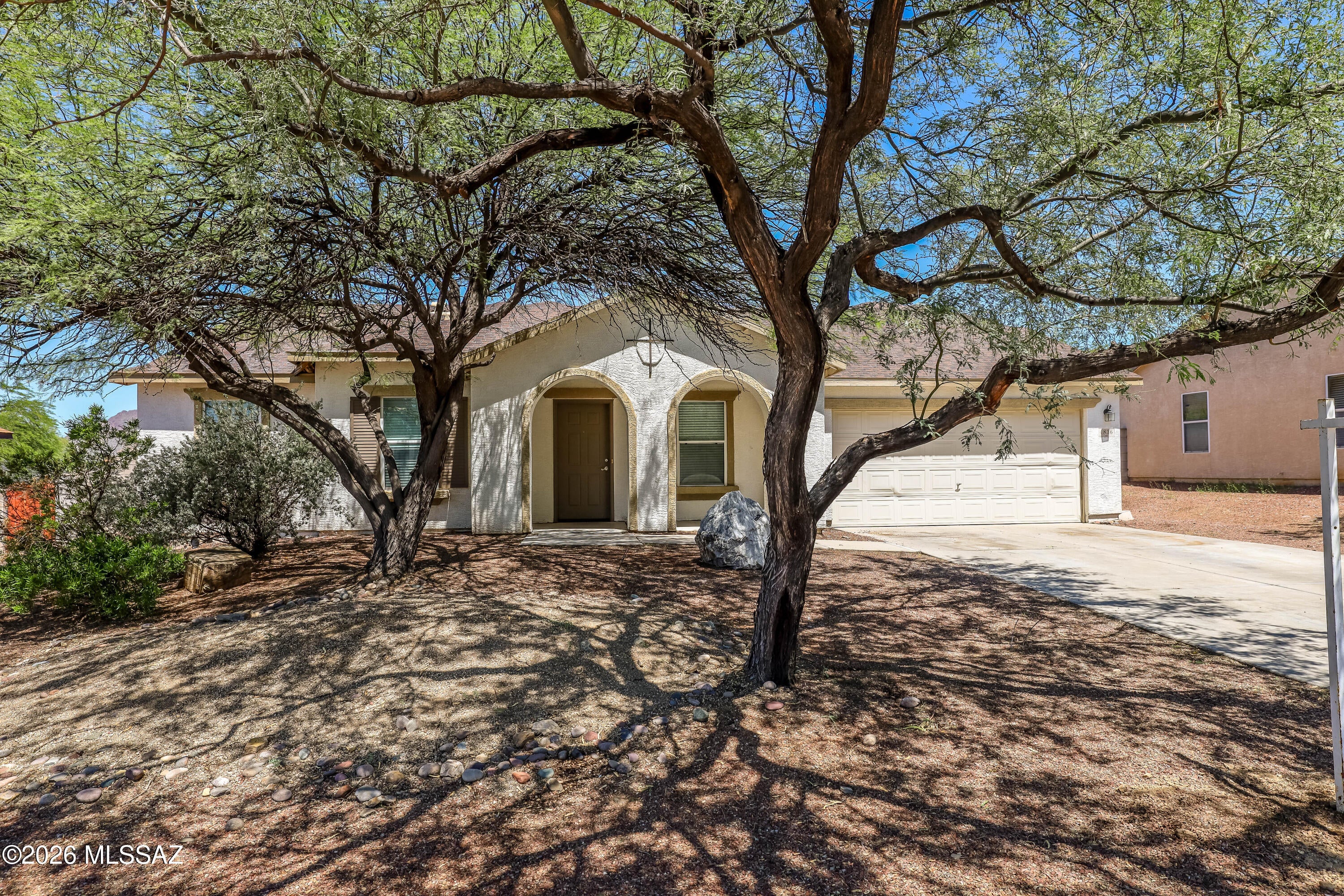 Welcome home to this inviting 3-bedroom, 2-bathroom home in the desirable Tucson Mountain Homes II community. Step inside to a bright, freshly painted interior featuring easy-care ceramic tile throughout--no carpet! The comfortable floor plan offers plenty of space for everyday living, while the generously sized backyard provides room to relax, entertain, or enjoy Tucson's beautiful weather. Conveniently located near shopping, dining, schools, and quick access to I-19, this move-in-ready home combines comfort, convenience, and low-maintenance living. Schedule your private tour today!