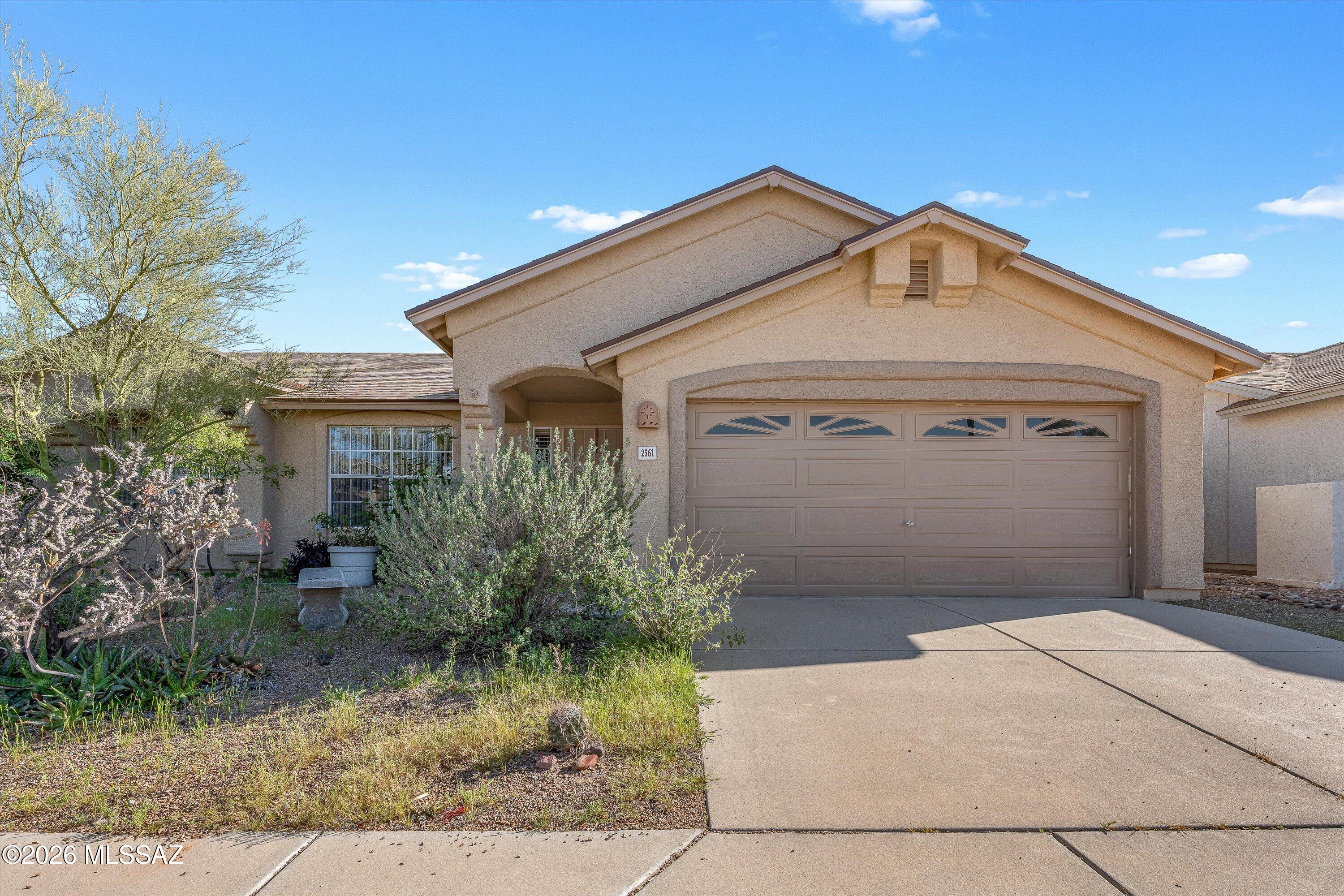Beautifully maintained home offering comfort, durability, and space to enjoy. Tile flooring runs throughout the main living areas and primary bedroom for easy maintenance, while two secondary bedrooms feature brand-new carpet for added comfort. The home also has a 2 year old roof providing peace of mind for years to come. Step outside to a large backyard with plenty of room to relax, entertain, garden, or create your ideal outdoor retreat. Conveniently located with easy access to nearby amenities, this move-in ready home combines practical updates with everyday livability.