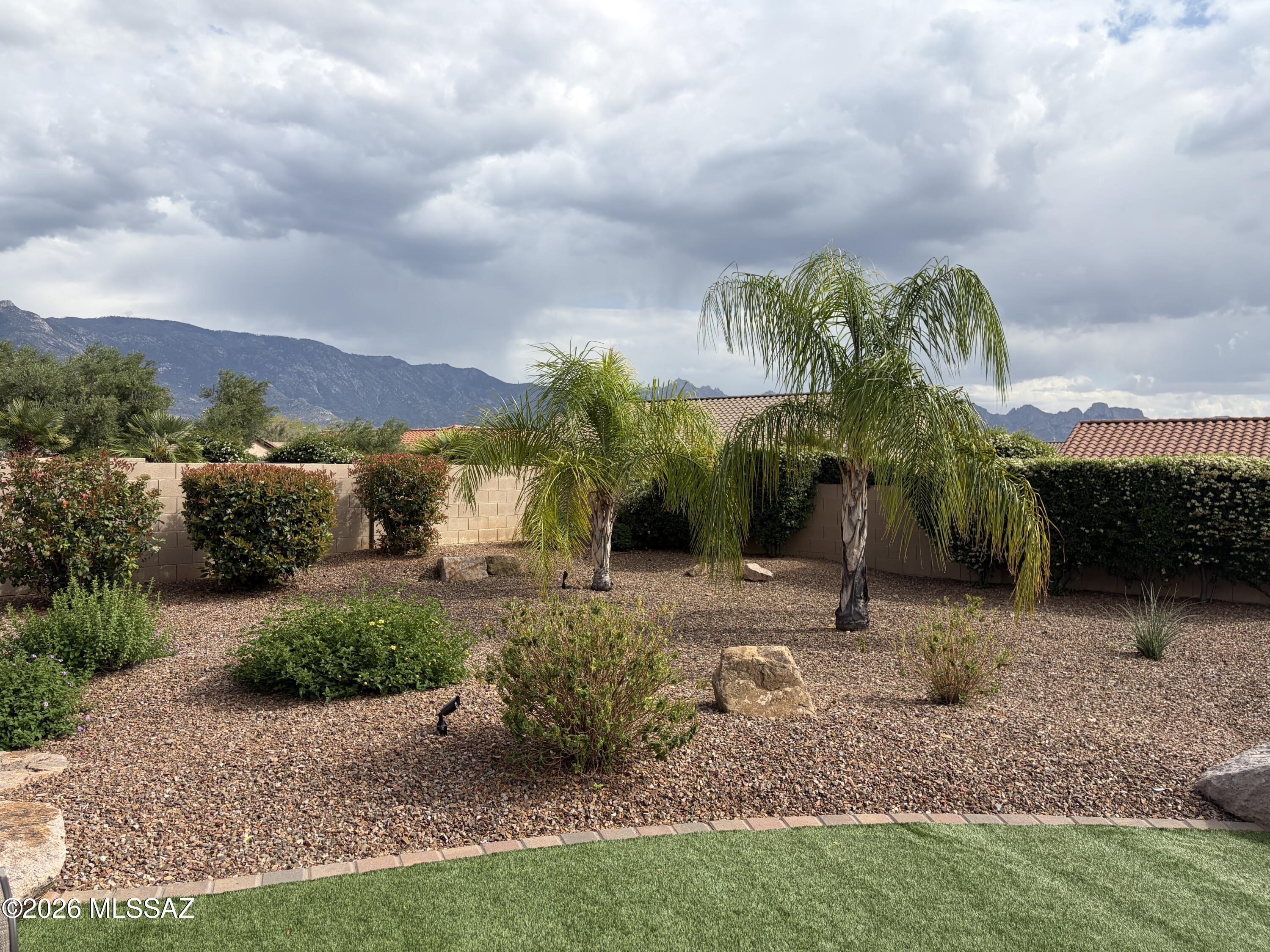 This beautiful home has it all! Casita, golf cart garage and mountain views. Featuring an open concept floorplan, 3 bedrooms, 3 full-bathrooms, three solar tubes for additional light, den with murphy bed, spacious covered patio, kitchen island, SS appliances, and Stonite countertop compliment the beautiful cabinetry. This home is set up for entertaining. Start enjoy the SaddleBrooke lifestyle today!