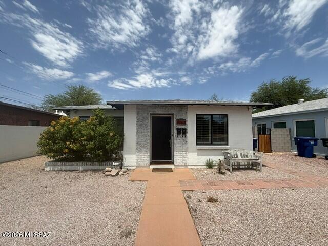 Available Now! Updated 2 BR. 1 Bath Home - just 2 Blocks from UofA in Popular Sam Hughes Neighborhood. Tile Floors throughout, natural light & ceiling fans. Features open Living/Dining Rm, open bar to Kitchen w/Granite counters, Stainless DW, Gas stove, Refrigerator, All Appliances included!  Full Bath w/Glass Block wall. Off street parking! Central A/C for Cool Comfort & Roof Deck for cooler evenings. Breezeway between front & back units  with shared washer & dryer & Bike storage.  Additional Utility fee of $300/mo. covers all utilities including water & sewer, trash, electric and natural gas. Also available is adjoining 1 Bedroom unit in rear of house, see  MLS #22620850