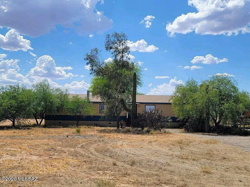 Fantastic 4 bedroom 2 full bathroom home located on a fully fenced acre right off the pavement. Split bedroom floor plan with a nice open living room and wood burning fireplace. Beautifully updated kitchen, newer HVAC system, roof, and exterior paint.