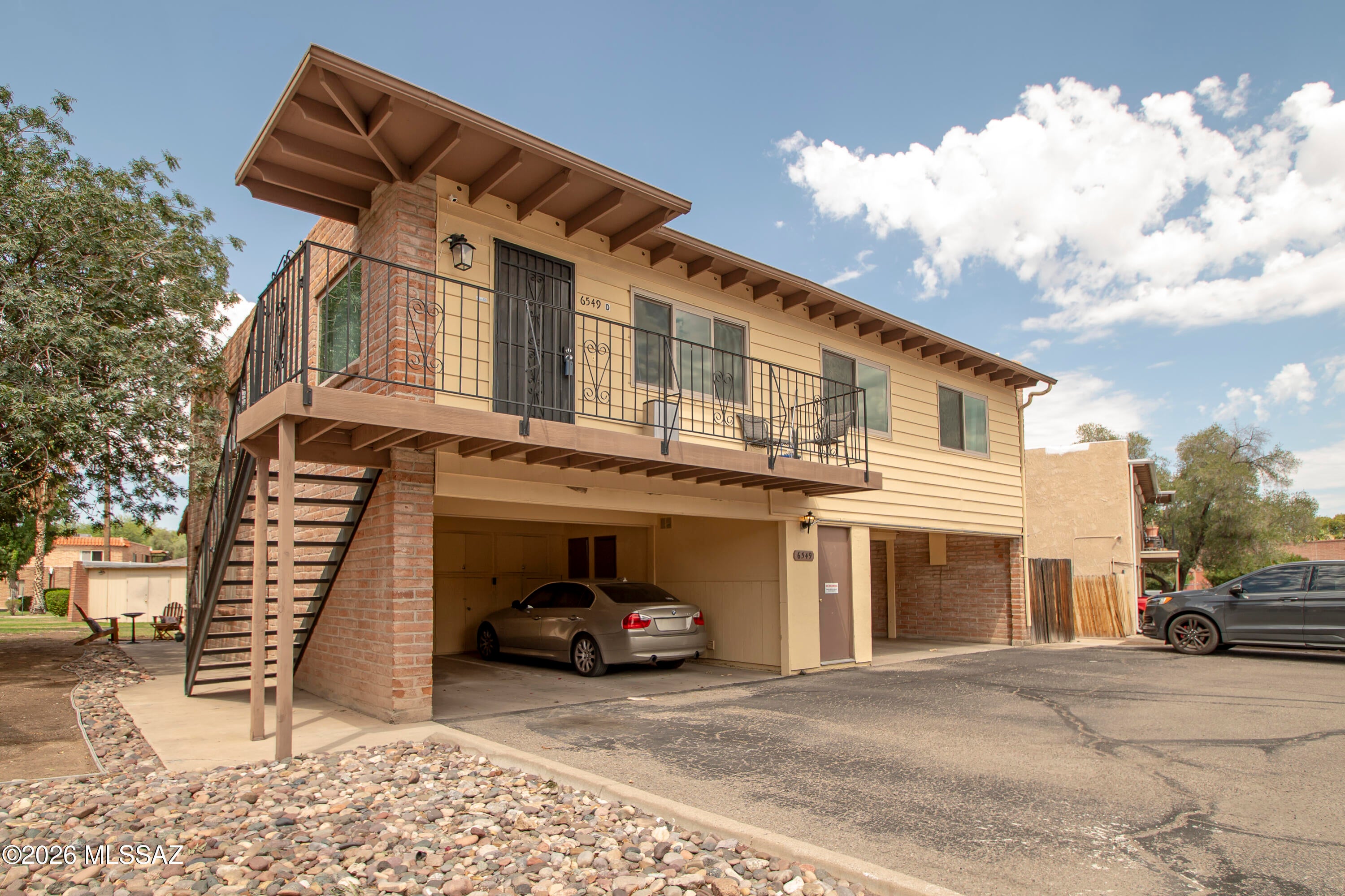 Enjoy comfortable east-side Tucson living in this well-maintained upper-level townhouse featuring 2 bedrooms, 1 bathroom, a covered 1-car carport, and additional private storage.
Ideally situated at the end of a cul-de-sac, this home offers mountain views and is conveniently located next to the community pool and just a short distance from the community mailbox.
Inside, you'll find updated windows, an upgraded kitchen, and a security screen door, adding both style and functionality. The bright, open living space makes the home feel welcoming, while the thoughtful updates provide move-in-ready appeal.
Conveniently located near the Kolb and Tanque Verde area, you'll enjoy easy access to shopping, dining, parks, and everyday conveniences. Whether you're looking for a full-time residence or a low-maintenance home, this townhouse offers a desirable location, practical features, and beautiful mountain views. Schedule your private showing today!