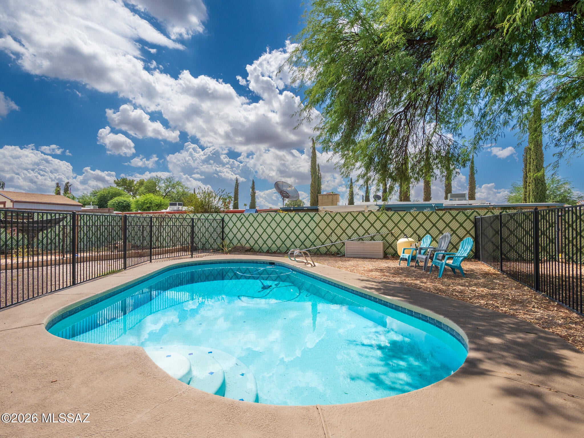 Text for a Walkthrough Video/more info. Refresh in the sparkling Pool beneath the mature trees of this 4 Bedroom/2 Bathroom 1466sf Brick Home on Tucson's Eastside. The fully Renovated Home features; Modern Espresso cabinetry, Granite countertops, Stainless Appliances, Pantry in the Kitchen; Concrete Overlay flooring throughout w/ no carpet; Tiled showers + Granite counters in the Bathrooms; newer Windows + HVAC system with Central Air Conditioning; Washer + Dryer incl; Car Port; and oversized Storage Shed. Located near Davis-Monthan AFB w/ convenient access to I-10 Freeway. 1yr minimum Lease. Available immediately. Costs are; non-Refundable $50/adult application, $2125 refundable Security Deposit, $400 Cleaning, $150/pet with Approved pet. Tenant pays Electric, Nat Gas, Water/Sewer/Trash. Pool Service included.