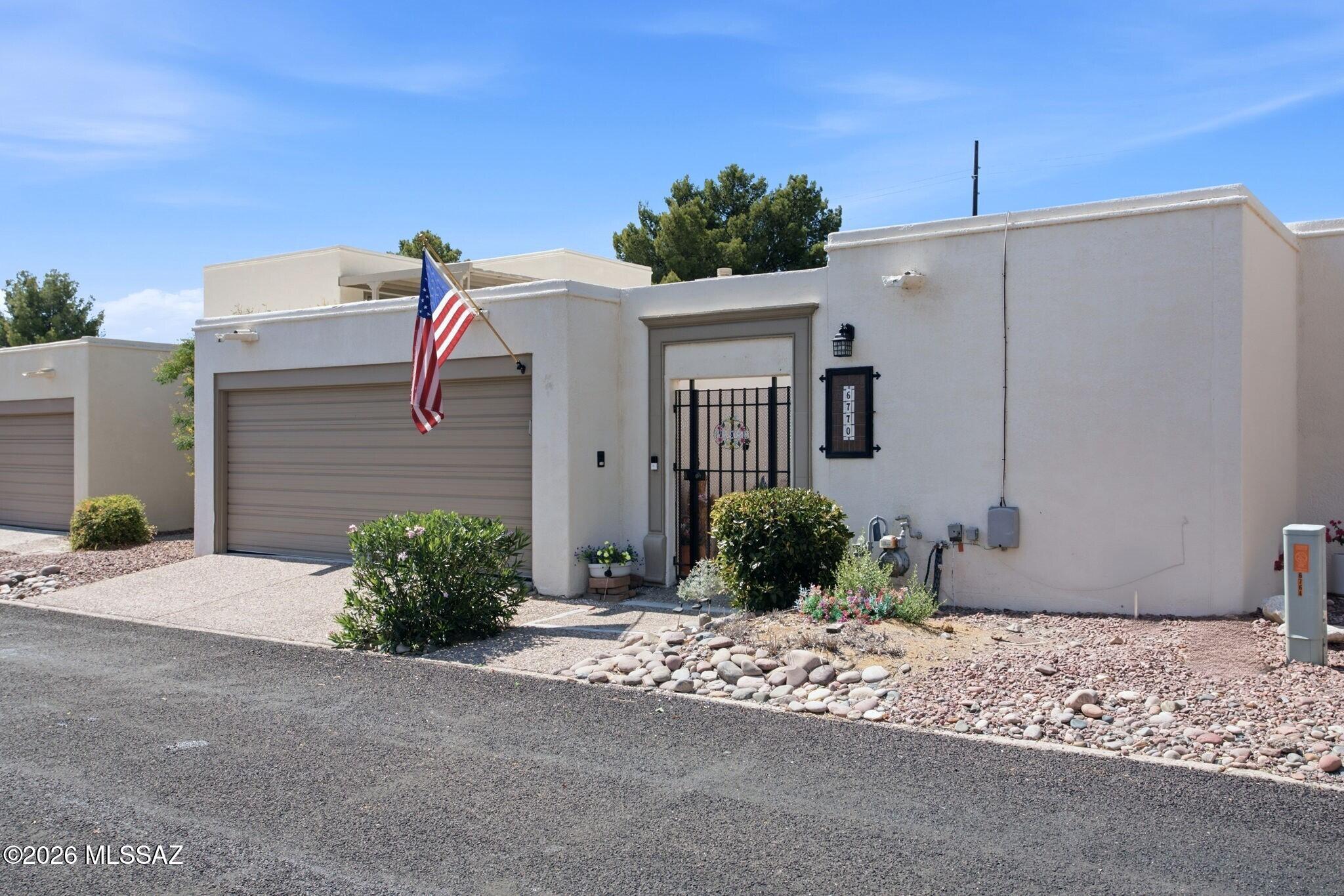 Welcome to Dorado Country Club Estates, where mature trees and lush landscaping create a park-like setting in the heart of Tucson. This well-maintained home offers a bright, open floor plan with spacious living areas, a large kitchen with abundant cabinet and counter space, and a generous primary suite featuring a walk-in closet and private patio access. Recent improvements include interior paint, updated skylights, roof coating, newer south-facing windows, HVAC (2021), and garage door. Enjoy low-maintenance living with the community pool and spa just steps away. Conveniently located near shopping, dining, golf, and everyday amenities, this home is ready for its next chapter.