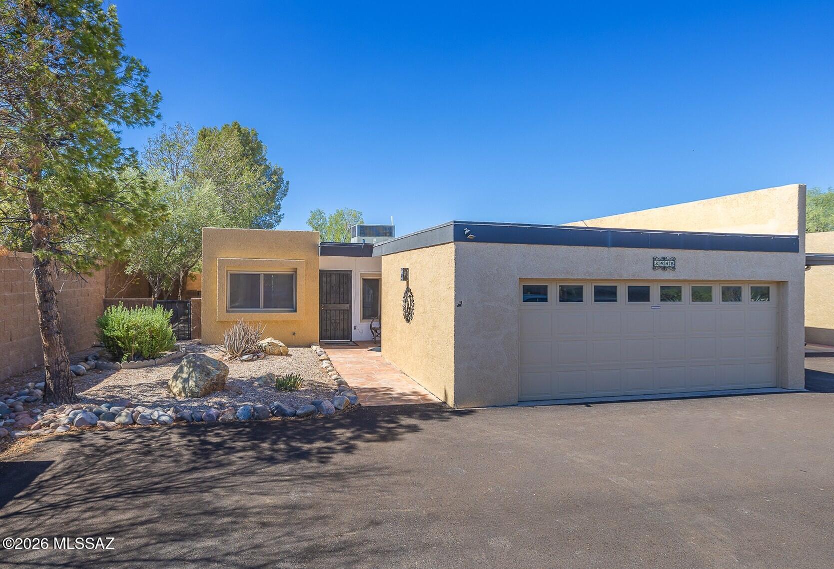 Amazing opportunity in charming Riverbend Estates Townhomes. Excellent location near River Road & Sabino Canyon. Close to great shopping, restaurants and the amazing ''Tucson Loop'' 137 mile-long bike path. This private end-unit Townhome is tucked into a quiet cul-de-sac and offers a large 2-Car garage. Lovely open floorplan w/ spacious living spaces, tile floors & wood-burning fireplace. Gorgeous air-conditioned Sun Room included in Listed Square Footage. Private rear yard backs to dedicated HOA open space w/ additional walled-in side yard. Features 2 Bedrooms plus Den/3rd Bedroom option that has closet and door, but no window. Priced to sell, move-in ready but a few small updates could make this a truly special property!
Riverbend Estates offers two Community Pools + Tennis Court.