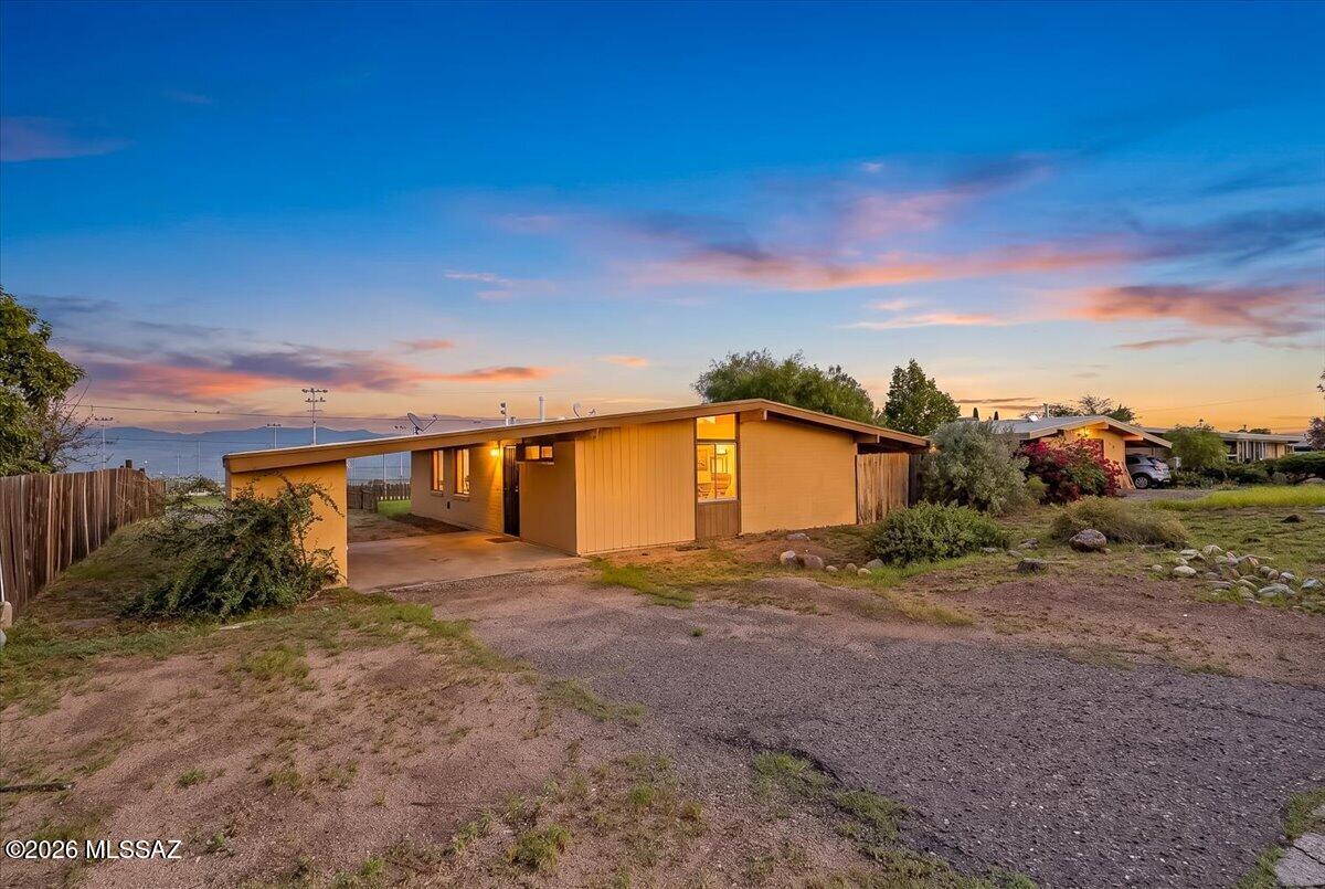 Welcome home to this move-in ready 3-bedroom, 1-bathroom home in the heart of San Manuel! Offering 1,083 sq. ft. of comfortable living space on a .18-acre lot, this inviting property blends practical living with the charm of small-town Arizona. The kitchen features a new range, farmhouse sink, & breakfast bar, creating a welcoming space for morning coffee or gathering with family & friends. Step outside to a spacious, flat, fully fenced backyard with room to relax, entertain or simply enjoy the mountain views that stretch beyond the property. A covered patio offers the perfect spot to unwind & enjoy Arizona evenings, while the storage shed provides convenient space for tools & outdoor essentials. With room for RV parking & alley access, there's plenty of flexibility for your lifestyle and hobbies. Just beyond the backyard, the community ballfields offer an open backdrop & easy access to outdoor recreation. Located in the scenic San Pedro Valley, San Manuel offers a relaxed pace of life surrounded by desert landscapes & mountain views. Whether you're a first-time buyer, looking to downsize, or simply ready for a home with room to enjoy, this property is ready to welcome you home!