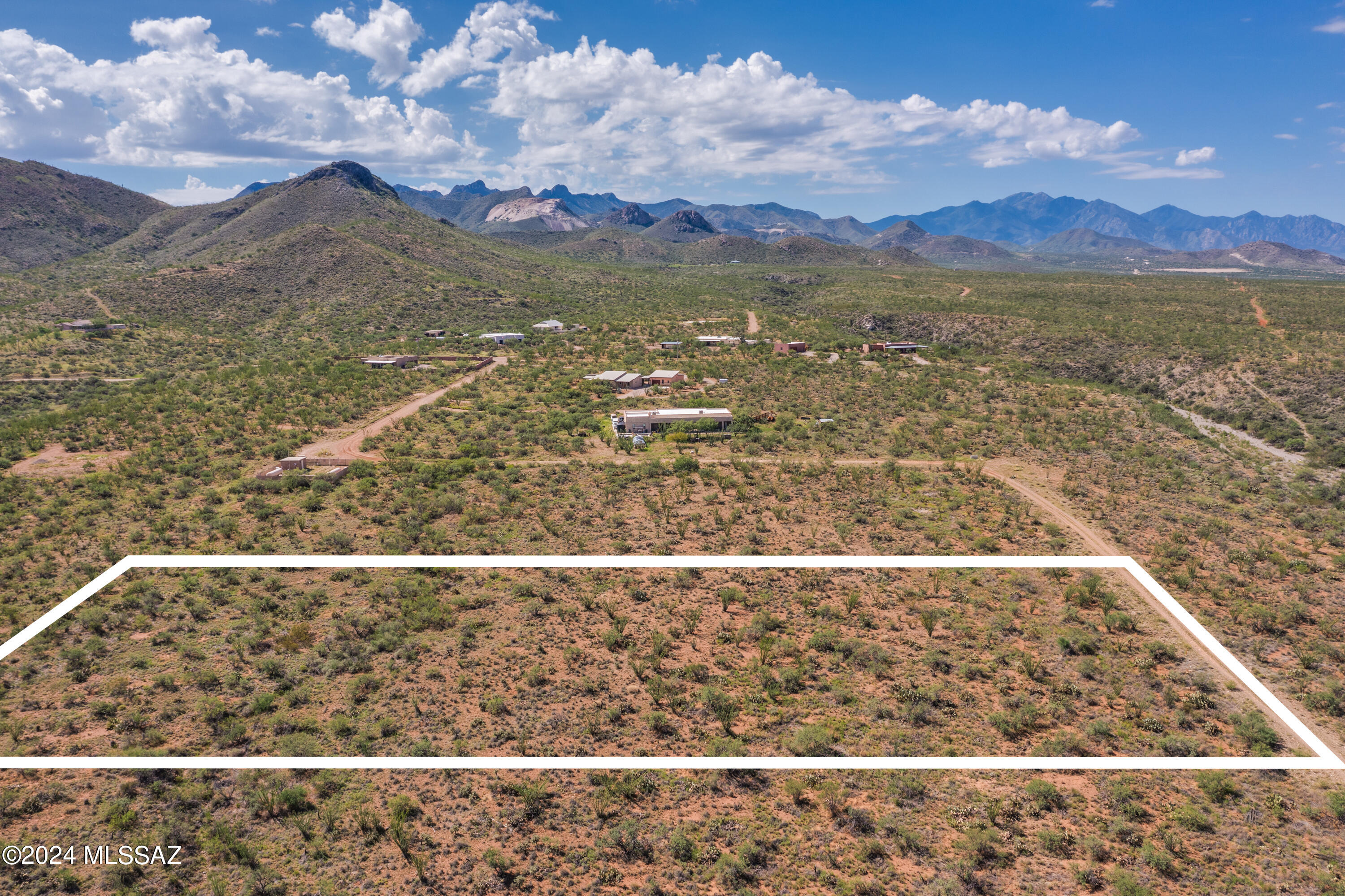 Discover an extraordinary 4.13-acre property in the peaceful haven of Corona De Tucson. Unimpeded mountain views, mature desert plant life and picturesque Ocotillo are brimming throughout this 4.13 acre lot that borders State owned land.  Stub out has been installed at the lot line for future water meter with City of Tucson water. With ample space to explore, you'll have plenty of room to roam and enjoy horseback riding, thanks to dedicated equestrian and hiking easements that encourage outdoor adventures. Property owners currently pay a $100 annual assessment for Road Maintenance.
