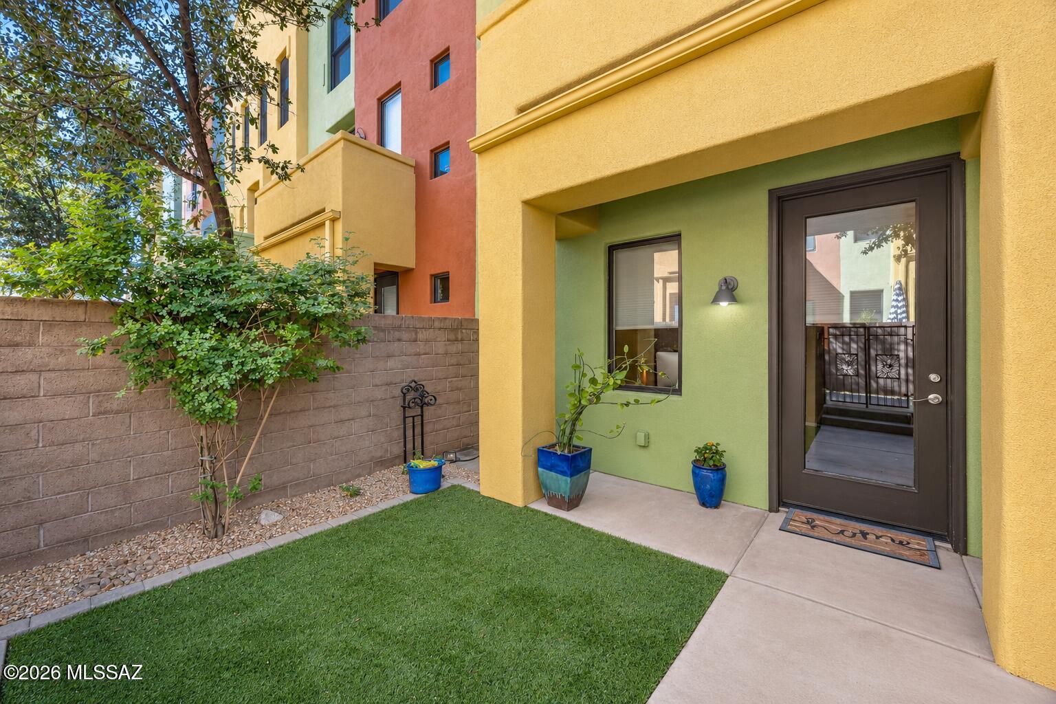 Experience elevated desert living in the prestigious Catalina Foothills. This beautifully updated three-level home with elevator is perfectly positioned to capture breathtaking mountain and city light views. The highlight is a freshly recoated view deck, an entertainer's dream for outdoor grilling and soaking in Tucson's world-famous sunsets.

The interior shines with a modern, upgraded kitchen featuring granite countertops, custom cabinets ,a newer refrigerator, and a newer dishwasher. 2 Newer Trane AC units. The open-concept living area boasts a custom bar, while a mix of stylish faux-wood flooring and plush carpet flows throughout. Garage has custom paint & epoxy floor. 
Close to dining, University of Az, the River walk bike path. comm pool & gym. Some Furniture can convey. Turn Key!