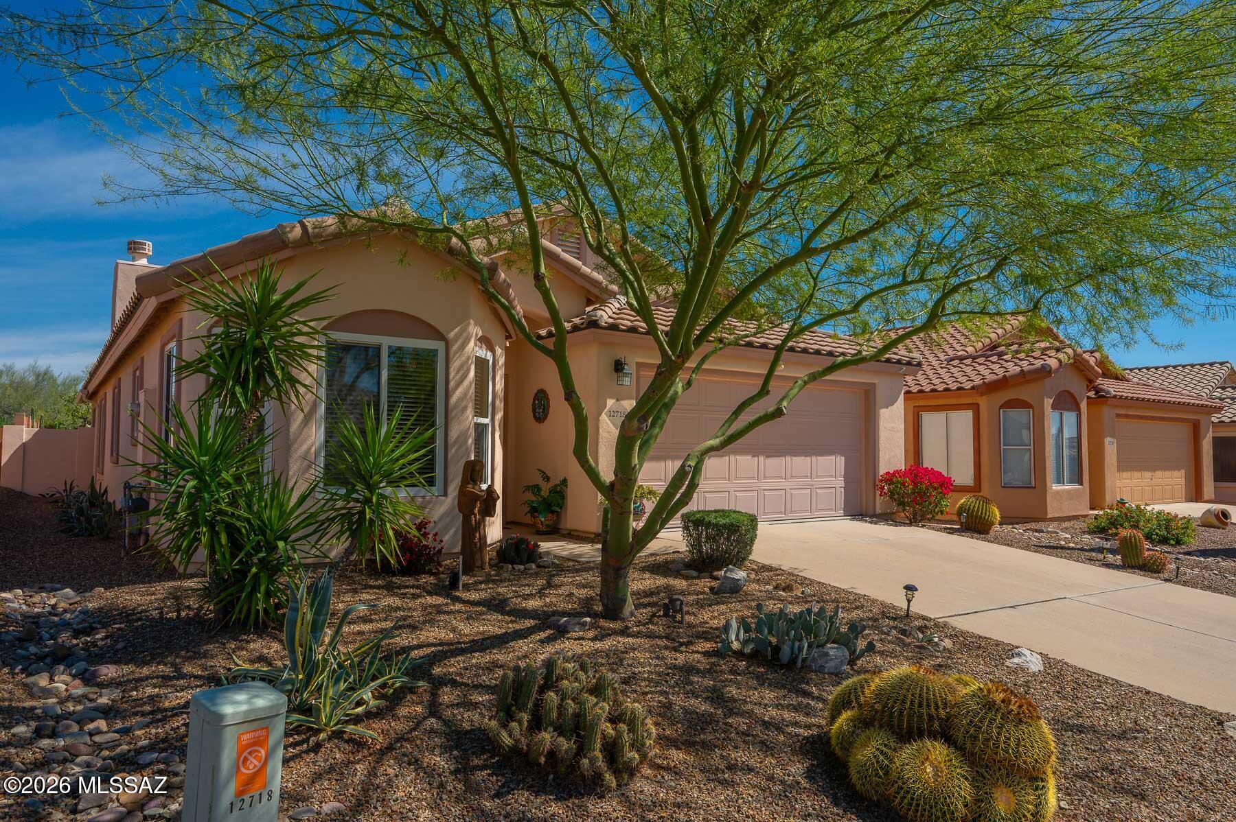 Welcome to this gorgeous home with Pride of Ownership & great curb appeal! Recently installed NEW ROOF! This home has been thoughtfully upgraded in the kitchen, great room, bathrooms & flooring. Wonderful screened in back patio with the seller's painted desert mural gracing one wall. The owners have meticulously maintained this home, and have had regular maintenance from licensed providers during their ownership. Too much to list here, see Amenities list in Documents. Private bk yard w/fruit trees.