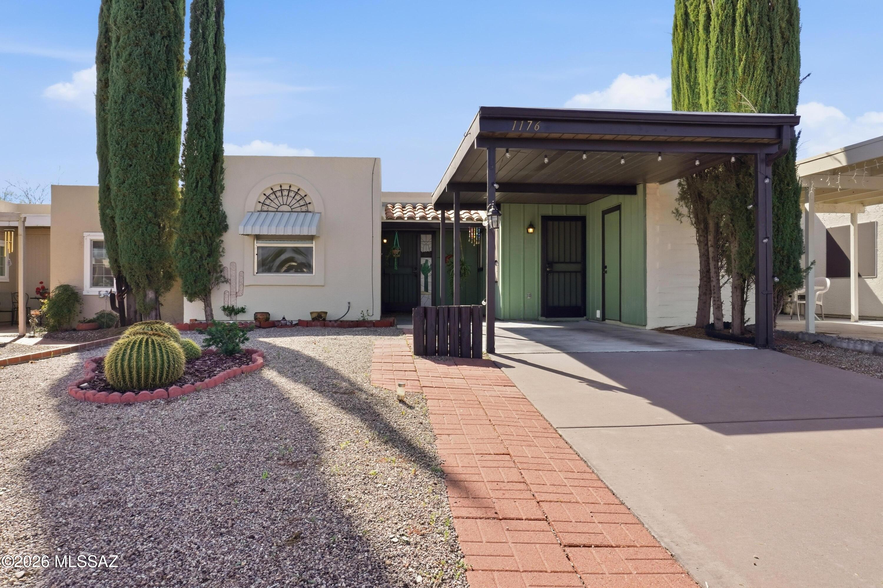 Privacy, natural light, and beautiful desert surroundings set this Green Valley townhome apart! With no rear neighbors and open space directly behind the home, enjoy peaceful views, gorgeous Arizona sunsets, and a private backyard setting. Inside, the home is beautifully maintained, bright, and welcoming--and it shows! This home has received so many compliments from agents who have toured it. Located within the Green Valley Recreation community, enjoy access to recreation centers, pools, fitness facilities, social activities, and more. Perfect as a full-time home or seasonal retreat. Come take a look at this beauty!
