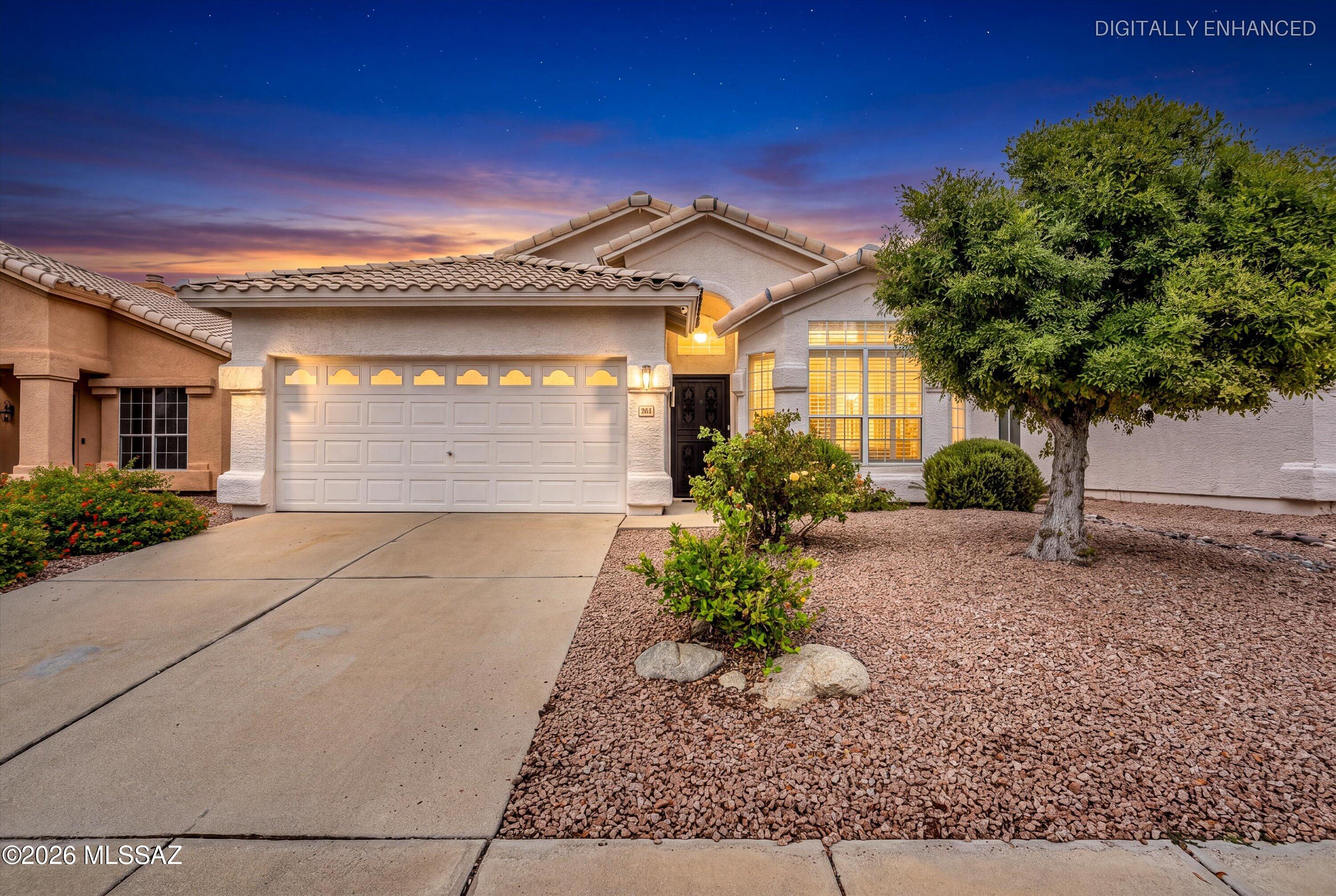 Fabulous Foothills home! This charming & well-maintained three-bedroom, two-bathroom residence is nestled in a picturesque community near stunning Sabino Canyon. As you step inside, you're greeted by an open living room that seamlessly flows into the dining area, showcasing an abundance of windows that fill the space with bright, natural light. The spacious kitchen is a chef's delight, featuring an island, a cozy breakfast nook, ample storage space, & sleek stainless steel appliances. Enjoy quality time in the generous family room, which opens onto a large backyard through elegant glass doors. The primary bedroom is a peaceful retreat, boasting bay windows, a large redone walk-in closet, and a luxurious en suite with a separate shower, a soaking tub & dual vanities...MORE The expansive, private backyard is perfect for entertaining, complete with a covered patio, misting system, laid brick & low-maintenance landscaping, offering an ideal space for relaxation and enjoyment. Updates include: brand new tile roof in July 2026, full PVC irrigation, attic access, hot water recirculation, complete interior & exterior repaint, plus the addition of WiFi smart switches and app-controlled technology. 

This home is a true gem, combining comfort, style, and convenience in one perfect package. District 16 schools. Don't miss this opportunity to make it your own!