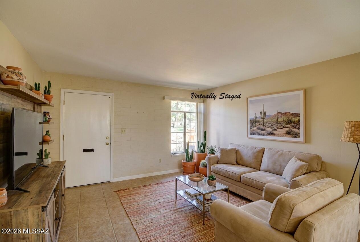 Discover this inviting 588 sq. ft. one-bedroom unit designed for comfort and easy living. The home features all-tile flooring for effortless upkeep and a beautifully updated kitchen with full-size appliances and stylish cabinetry. The spacious great room, accented with neutral tones and built-in shelves, offers the perfect space for relaxing or entertaining.
Step outside to your private front patio, ideal for enjoying Arizona's sunshine or hosting friends. The comprehensive HOA takes care of major essentials, including Roof, HVAC, and water heater replacement, plus exterior paint, pest control, and trash service. Giving you peace of mind and low-maintenance living.
Villas West is a well-established community boasting 65 acres of lush common areas, perfect for social gatherings, pet friendly strolls, and connecting with neighbors. After a fun day at one of the nearby Green Valley Recreation centers, explore the area's wide selection of restaurants offering diverse menus and scenic patio dining. Then come home and step outside to your private front patio. Ideal for morning coffee in the shade or evening gatherings with sunset views.
This property combines convenience, charm, and community and the benefits of east-west exposure. Don't miss your chance to make it yours