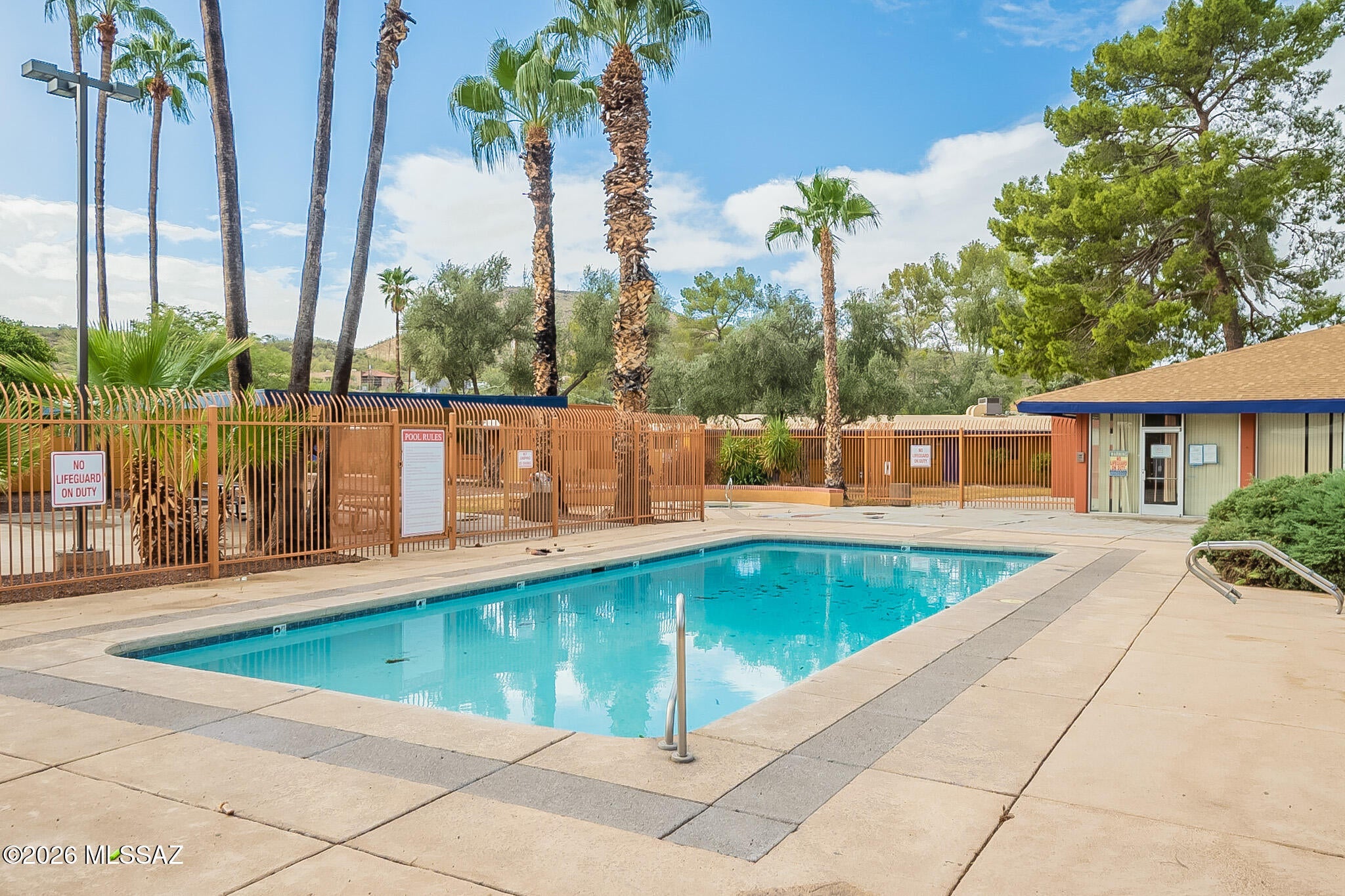 VIDEO TOUR AVAILABLE BY REQUEST.  Discover low-maintenance, comfortable living in this meticulously cared-for 1-bedroom, 1-bathroom condo in the desirable gated Sunset Foothills community on Tucson's west side.  This adorable 672 square foot unit is affordable, FHA/VA financeable, exceptionally clean, bright and move-in-ready!  This nicely-updated home is perfectly situated in the community with convenient access to the community pool and common areas, and excellent parking.

Residents benefit from desirable community amenities including a sparkling pool and spa, clubhouse, basketball court, picnic/grilling areas, playground and beautifully maintained grounds!  Association fees cover exterior maintenance, roof replacement, front yard care pest control, garbage collection, and gated. This home has a newer AC unit for peace of mind and the convenience of laundry stack at the home.  Location is highly desirable and close to Downtown Tucson, UofA, Pima Community Collect, Tumamoc Hill and the rapidly growing Mercado District.

FURNISHINGS AVAILABLE - Turnkey winter retreat or furnished rental if furniture is desired.