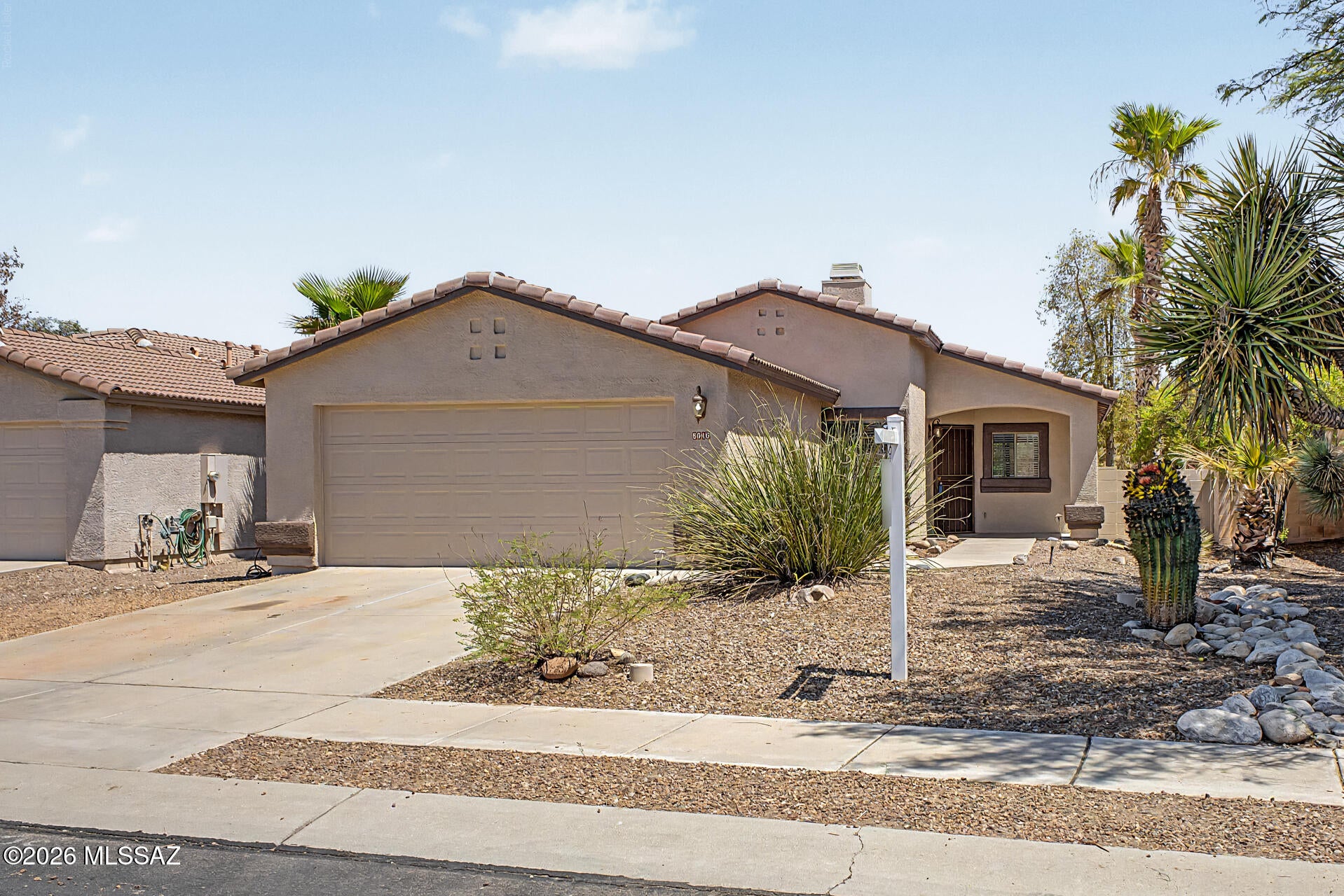 Former Model Home for this community!   Come home to cozy-this charming 3 bed/2 bath with fireplace located in a community neighborhood with access to multiple pools and close to outdoor amenities, shopping and to the Highway! Bright and inviting living spaces featuring vaulted ceilings, all tiled throughout and brand-new carpet in 3 bedrooms. The kitchen has been newly remodeled with new stainless-steel appliances, 5 burner gas stove, oven, refrigerator and a brand-new coffee bar with upper and lower cabinets, special wood countertops! Recessed lighting and crushed granite farm sink. Separate laundry room, Washer/Dryer stays. Beautiful master bath tiled shower w/ample room for 2. Freshly painted exterior, new door locks, Pella sliding door .Agent related to seller. Move-In Ready!