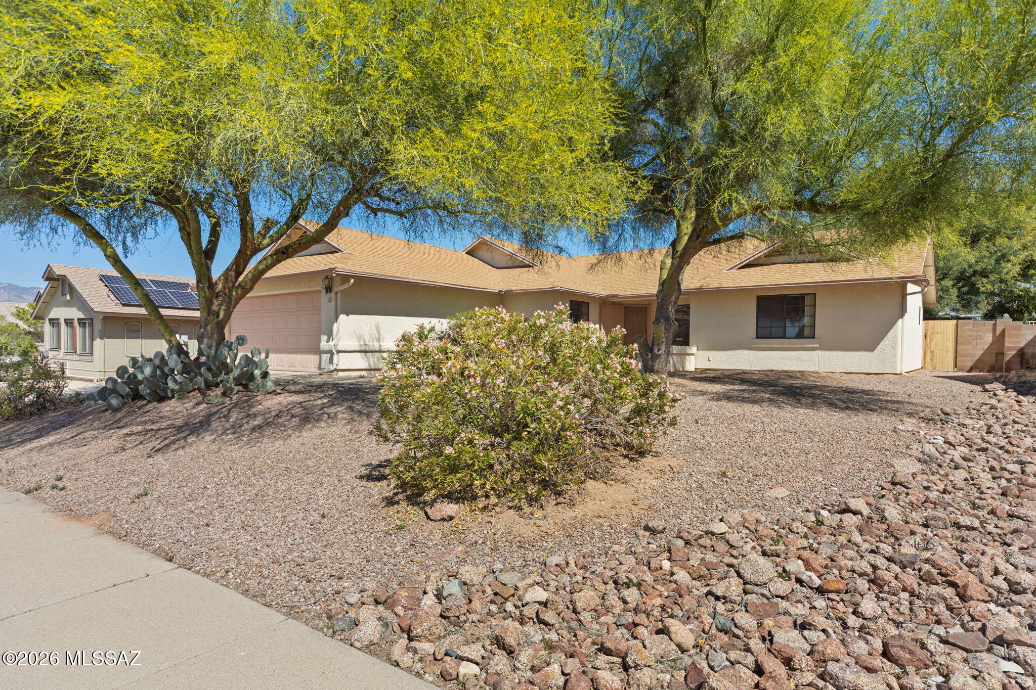 Come see this beautiful home with nearly 1700 sf 3 bedrooms, 2 baths, and a formal dining or den room off of kitchen. Located on a desirable Cul-de-sac lot, with East facing back yard for those warm AZ Evenings. Plenty of room for a pool, or whatever you are wanting to create! Kitchen has all new appliances, and flooring has been replaced throughout the home. Full repaint, and new lighting highlights the vaulted ceilings and open feel of the home. Large back yard with mountain views to the North.NO HOA on this home allows for you to create your own dream oasis in the desert! Call for a showing today!