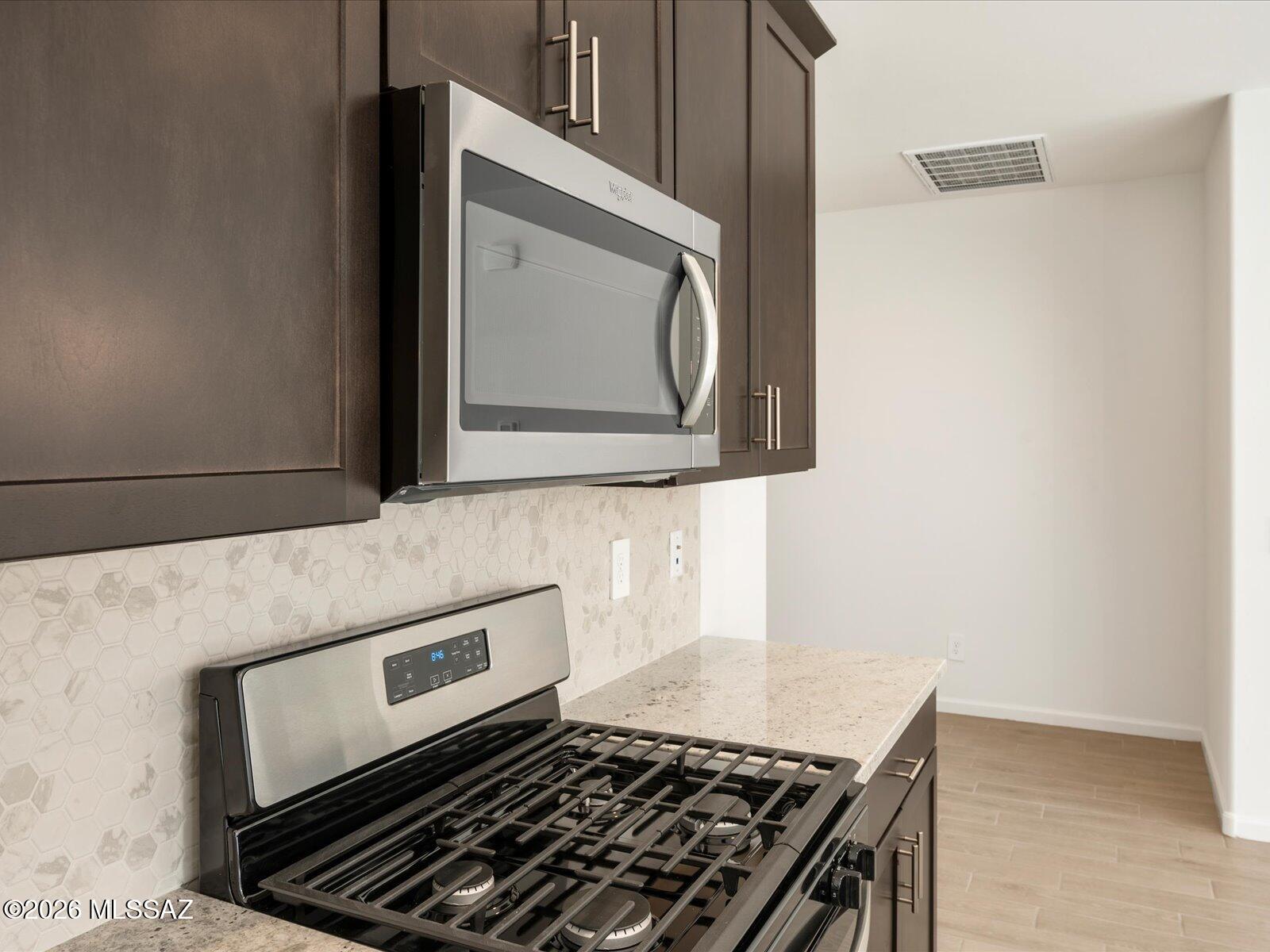 Move in Ready. Appliances Included. Energy Efficient. 

This 3-bedroom, 2-bath home offers an inviting open layout with a spacious great room flowing into a modern kitchen accented by a central island--ideal for gatherings. The Elemental design package features umber cabinetry, shaded gray granite countertops, wood-look tile flooring, and warm neutral carpeting. Relax in the secluded primary suite thoughtfully positioned for privacy. Located in Entrada del Toro in Sahuarita, AZ, starting from the high $300s. Community amenities include pools, a splash pad, walking and biking paths, and a safari-style park, all with convenient access to I-19 and major employment corridors.