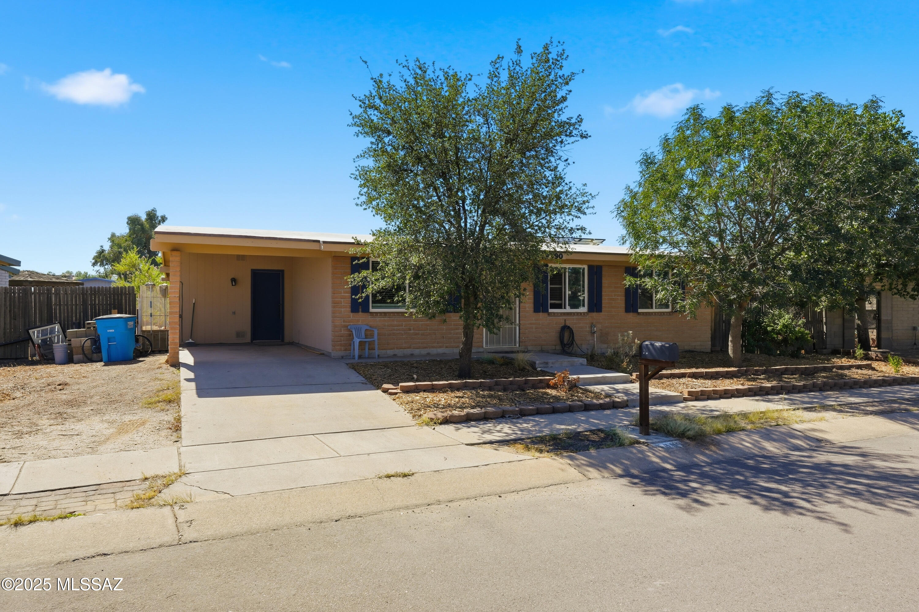 RARE FIND! 4BD/2BA home on nearly 1/4 acre lot w/ no HOA. This home features a newly remodeled kitchen w/ granite countertops & modern finishes. New vinyl plank flooring flows seamlessly throughout the home for an updated look! 
The primary bathroom has been completely remodeled and enlarged. A newer HVAC system adds comfort and peace of mind.
Enjoy outdoor living on the covered back patio, overlooking a spacious backyard w/ raised garden beds, fruit trees, (Orange, apple, fig, pomegranate & lemon) extra storage shed, and a dedicated play area. A perfect place for relaxation or entertaining.
Nestled in a quiet cul-de-sac on Tucson's desirable Northwest side, this home is close to everything--shopping, theaters, schools, Pima College, libraries, hospitals, parks, and I-10.