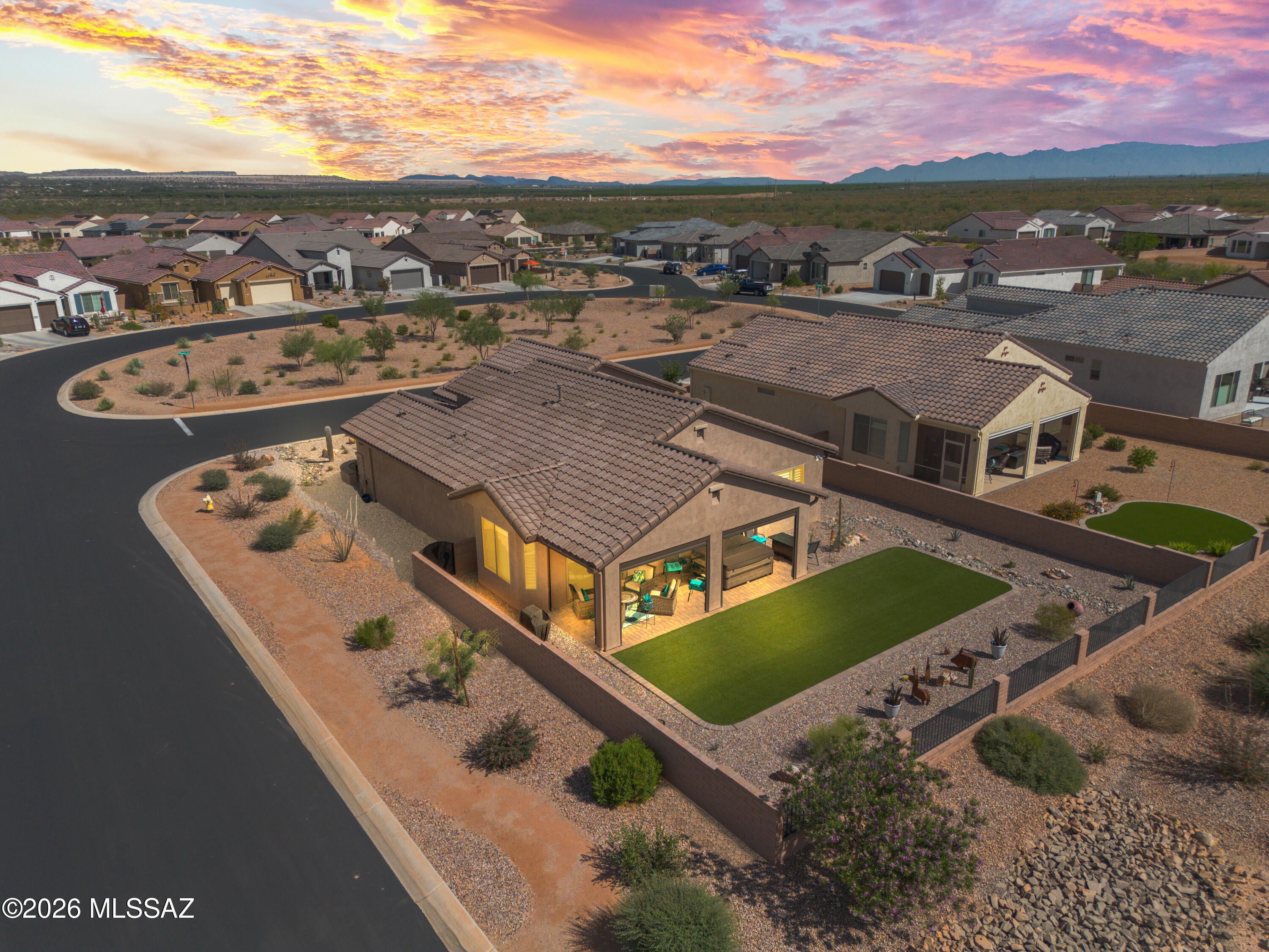 Welcome to luxury living in the heart of Quail Creek! This newly built expanded Montecito floor plan sits on a corner lot with peek-a-boo mountain views, offering both privacy and curb appeal. From the moment you arrive, you're greeted by a beautifully landscaped, fully fenced yard and an inviting courtyard, perfect for morning coffee or evening relaxation. Inside, no detail has been overlooked. This home is truly turn-key with every upgrade already in place. The thoughtfully designed floor plan features an expanded den and laundry room, an angled dining bay window, and an extended outdoor living space ideal for entertaining. The sparkling kitchen shines with quartz countertops, full-height backsplash, upgraded cabinetry with crown molding, all soft-close features, and premium fixtures The upgrades continue throughout with tile flooring in main living areas, upgraded carpet in bedrooms, 5¼" baseboards, and whole-home sound insulation. Bathrooms boast quartz counters, upgraded tile surrounds, and sleek glass enclosures.

Enjoy modern convenience with a whole-home water filtration system, upgraded electrical and lighting package, and Pella windows with luxurious plantation shutters throughout.

Step outside to your private backyard retreat featuring power shade screens, complete desert landscaping, artificial turf, the list goes on creating your own personal oasis.

Car enthusiasts and golfers alike will love the 4ft extended garage with easy to maintain epoxy floors, utility sink, and dedicated golf cart garage.

This is the one that truly has it all--location, upgrades, and lifestyle.