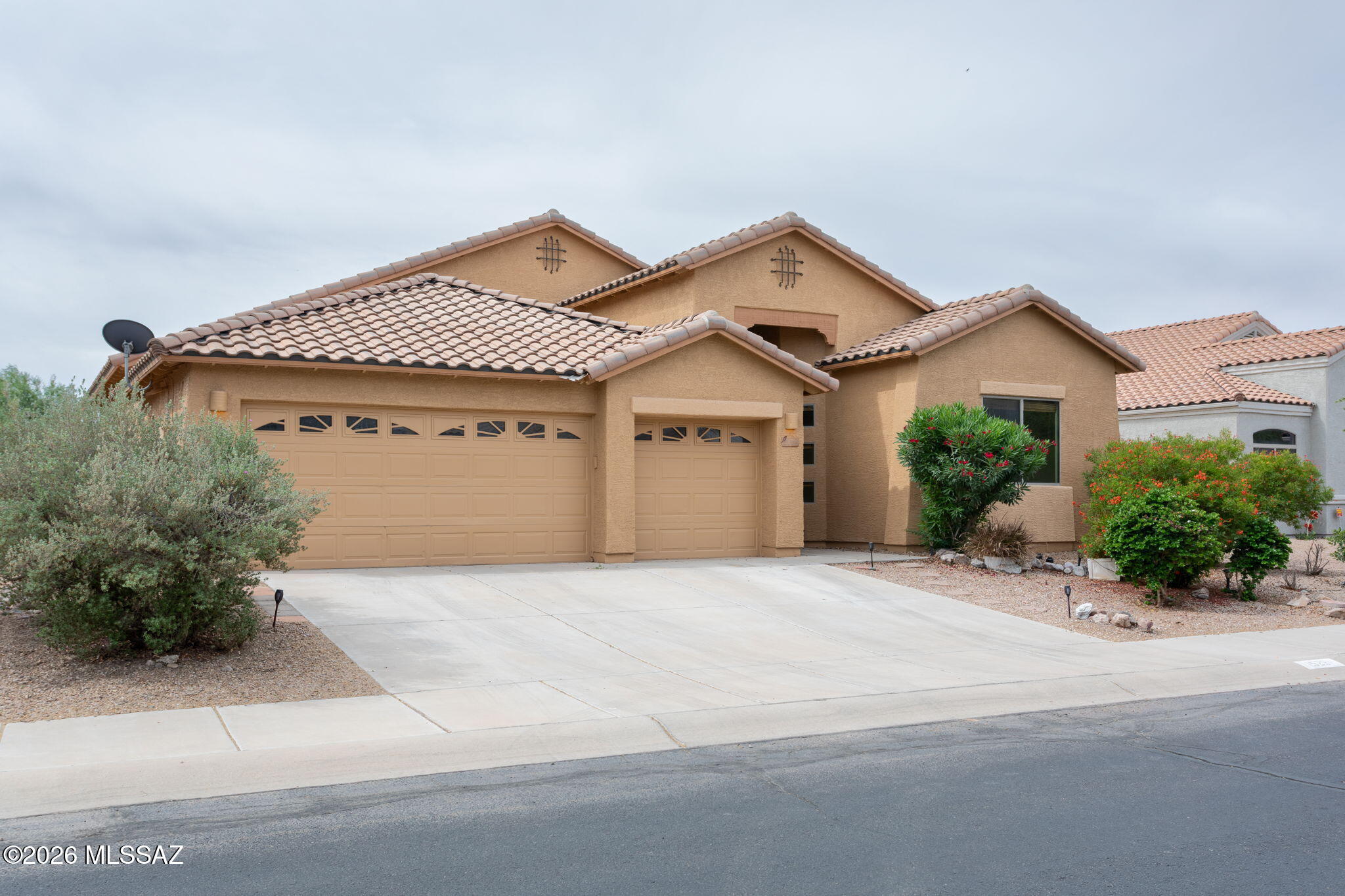 Open House Saturday 8/29/2026 4pm-6pm.
*NEW AC &  WATER HEATER INSTALLED* Rare single-story in Gladden Farms featuring one of the community's larger and most desirable floorplans with over 2,300 sq ft and a hard-to-find 3-car garage. Designed for flexibility, this layout offers multiple living areas ideal for entertaining, working from home, or multigenerational living. The open-concept kitchen flows into the main living space, while generously sized bedrooms provide comfort and privacy. Custom upgraded tile and natural tones throughout create a warm, modern feel. Opportunities for single-story homes with this size and garage setup are limited. Located in growing Marana with easy access to I-10, shopping, and dining.