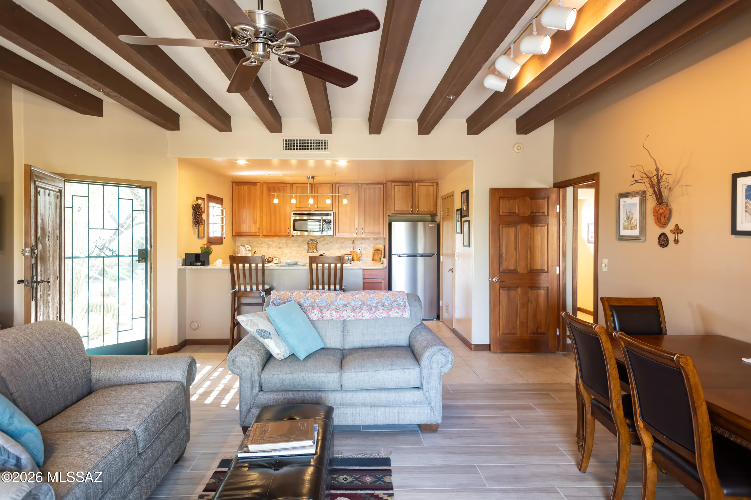 This furnished turn-key Casita has great views of the Tucson Mountains, Starr Pass Golf Course and the J W Marriott Resort from a large fenced-in patio.  The unit has a large living room between spacious primary and guest bedrooms.  A few key features are granite counter tops, stainless steel appliances and a full-size stackable washer and dryer. 
It is within walking distance of the Starr Pass golf course club house and the Starr Pass trail head.  One can join the Country Club to enjoy the pool, spa and fitness center. 
Close to many things like shopping, entertainment, hospitals.   Easily hop on I-10, go to downtown Tucson where you can enjoy a plethora of restaurants and activities, catch a game at the University of Arizona or find yourself one of the many hiking trails around!