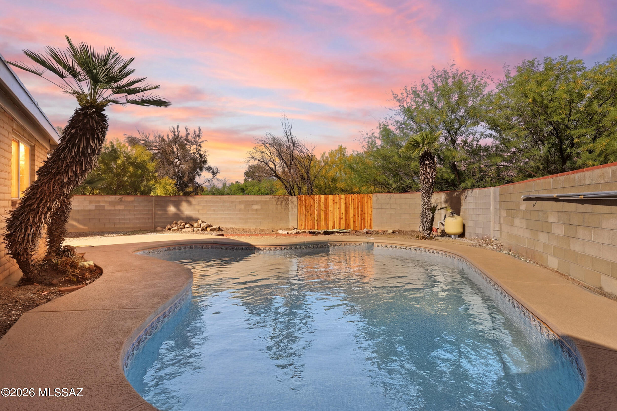 This beautifully renovated Ranch style brick home showcases a gorgeous fully updated upscale kitchen with granite countertops, sparkling backsplash, and exquisite stainless steel appliances. The modern design flows throughout the home with its open concept, high ceilings, and ceramic tile flooring, creating a warm, sleek, and elegant feel. 
Both bathrooms have been completely upgraded with top of the line finishes and modern style. Each bedroom has plush carpet, dual door closets, and remote controlled led fans. 
Enjoy the comfort of your central heating/cooling, new windows, fresh paint, re-done roof, and new water heater.
This home is situated in a corner lot, with no back neighbors, no HOA, and in .18 ample acres! Step into your private backyard with block wall fencing, mountain view and 180 degree covered porch. With the convenience of dual gates for your RV, and a like new cool sparkling pool with new pump/sand filter/epoxy thats perfect for entertaining guests or simply unwinding as you enjoy your sunset views.. Picture yourself enjoying the sunny Arizona evenings in your own private oasis!
With nearby trails, schools, and lakeside lake/park only walking distance; this beauty will not last. Make it yours before its gone!
Owner/Agent.
