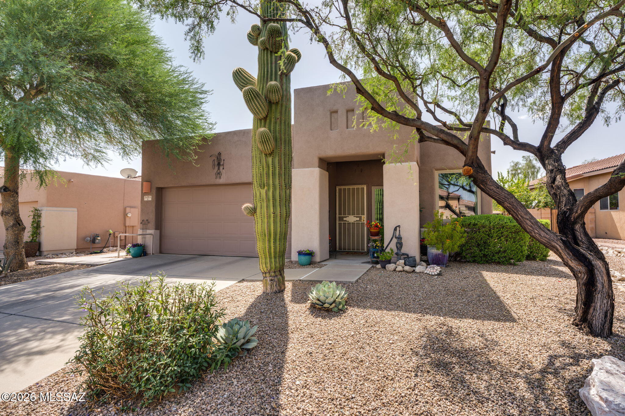 Sellers will accept or counter offers between $385k-$400k: Range Priced. Come see why this one stands out! Quality-built AF Sterling gem offering refined comfort, versatility & thoughtfully curated improvements. This inviting home features a flexible floor plan with formal living & dining spaces complemented by a welcoming family room just off the kitchen, creating an effortless setting for entertaining, relaxing, or a den/office. A host of thoughtful enhancements elevate everyday living, including tile flooring throughout, newer kitchen appliances, dual kitchen pantries, a custom walk-in shower, Renewal by Andersen windows & an architecturally barrier-free design. Meticulous care by the original owners offers peace of mind with major improvements already addressed & consistently maintained including a roof radiant barrier system, regular roof recoating & Sentricon termite baiting network (see attached list under documents tab for all improvements). Escape the afternoon sun in the comfortable enclosed patio, then step out to your private hot tub & low-maintenance yard. It's the perfect setting to unwind & enjoy beautiful Tucson evenings under the stars. The extended 20 x 22 garage with utility sink adds exceptional storage. Nestled in a small community of just 87 homes, this exceptionally well-maintained neighborhood adds to the pride of ownership & overall appeal, while its convenient location near The Rillito River Park Trail offers easy access to scenic walking, biking & outdoor recreation. Don't wait... Come see this one before it's gone!