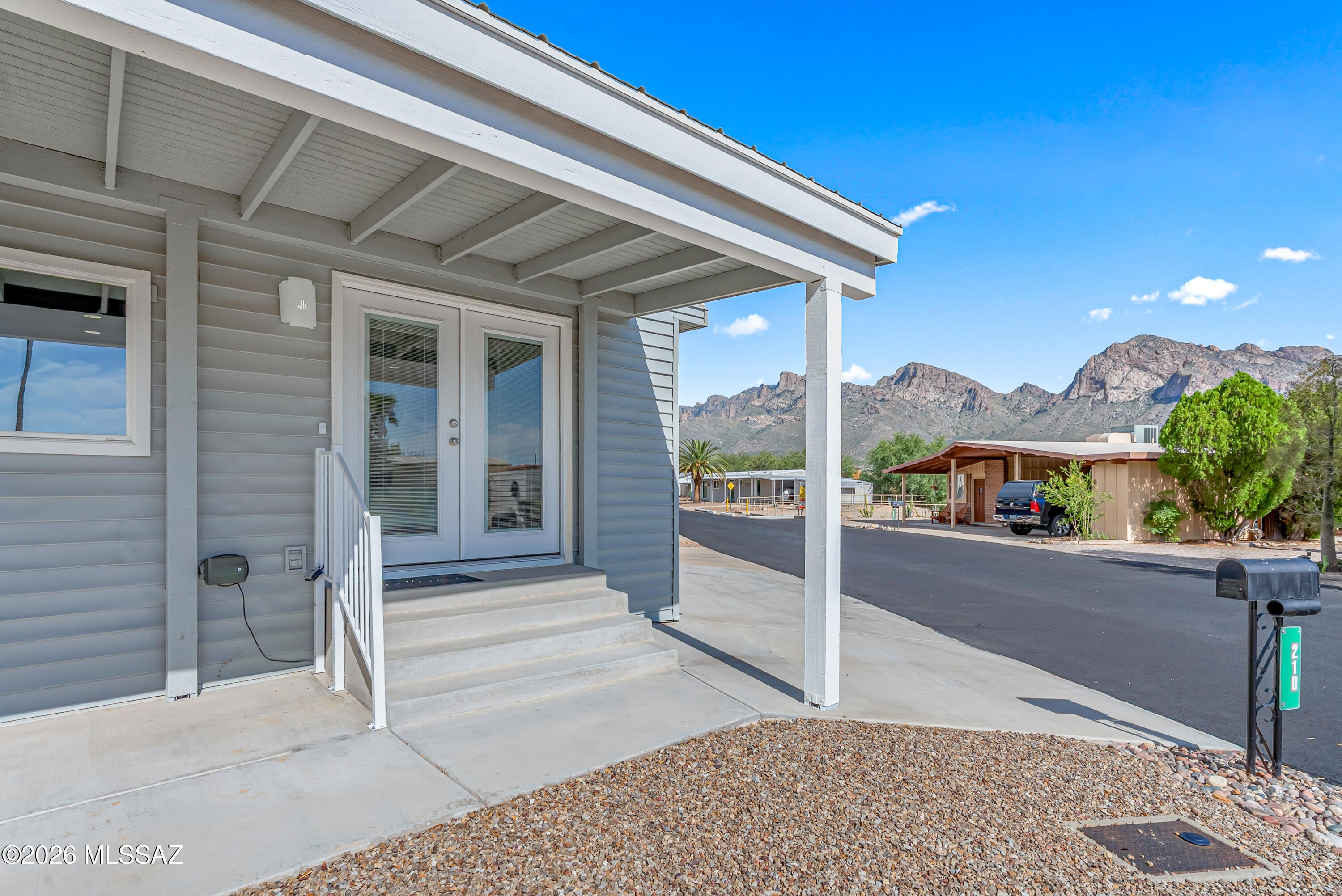 3D Zillow Tour available! Welcome to this exquisite 2 bed 2 bath home with breathtaking mountain views located in highly coveted The Highlands where you own your own lot. Come inside & discover an inviting open floor plan with wood-look flooring, neutral colors, ample storage & loads of natural sunlight. Newly enclosed Arizona room with metal roof provides a hobby space, storage or game room offers additional  264 sq feet. Lovely kitchen features dovetail cabinetry with pull outs & center island. Home fully remodeled 2023. Home offers Bali cell top down bottom up blinds on all new windows. New plumbing, new electrical & new hot water heater. HVAC new 2025. HOA offers pool, clubhouse & activities plus an RV lot for storage. Take a drive to the community and schedule your showing today
