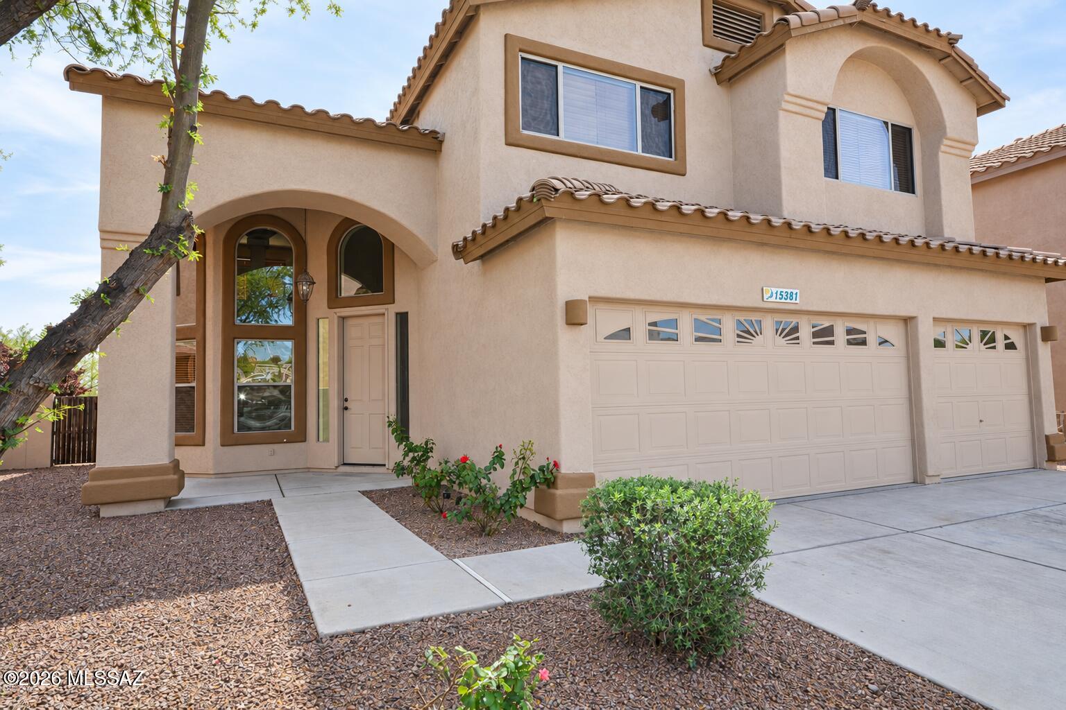 LOCATION, LOCATION, LOCATION! This gorgeous two-story home located in the gated community of Agua Azul is an enticing blend of comfort and style and has no rear neighbor. With 2451 sqft this Richmond American Sierra model features 3 bedrooms plus loft , 2.5 baths, 3 car garage, soaring ceilings, grand staircase, and balcony overlooking the lovely backyard. As you enter 19 ft ceilings welcome you into the formal living/dining room with ceramic tile flooring that extends throughout the main floor, wrapping around to the kitchen in conjunction with a large family room. The Kitchen offers Granite counters, newer faucet, Stainless steel appliances, and a delightful breakfast bar and nook. It opens up to the family room with a modern  tile surrounded gas fireplace, providing you with the perfect space to unwind and relax. Upstairs, the expansive primary suite offers balcony access, a great spot to enjoy the sunrise, and its own bonus space, perfect for a reading lounge, yoga area, or quiet retreat. The ensuite bathroom features dual sinks, a garden tub, a separate shower, and a spacious walk-in closet. You'll also find 2 additional bedrooms and a well-appointed guest bathroom with a shower/tub combo. The loft gives extra living space and can be used as a game room, play area, or additional lounge. Additional highlights include a new upstairs HVAC system installed in 2025, a refurbished downstairs HVAC system (2025) , a spacious laundry room, and a conveniently located main-floor powder room. The 3-car garage provides plenty of room for vehicles, hobbies, or extra storage. Its prime location offers a short distance to Sahuarita Lake, club house, pools, parks and schools. All around a fantastic home you can not miss.