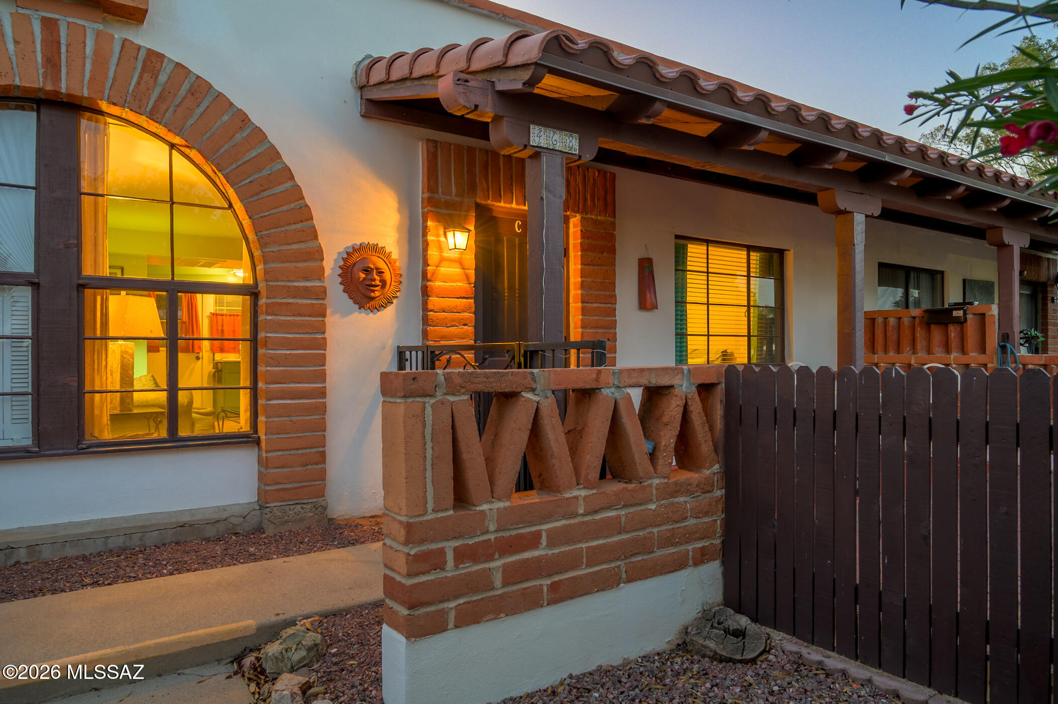 Where the desert sky puts on a show every evening. This charming 1BR/1BA bungalow-style condo carries the soul of old Green Valley -- warm brick, an original vintage stove, open-shelf kitchen with an artisan feel, and a community that moves at your pace. Steps from the park, two pools, and scenic walking paths, with mountain views that glow at golden hour. HOA covers AC, heat, water, and garbage. GVR membership included. Turnkey and ready -- for the life you actually want to be living.  **Furniture Included**