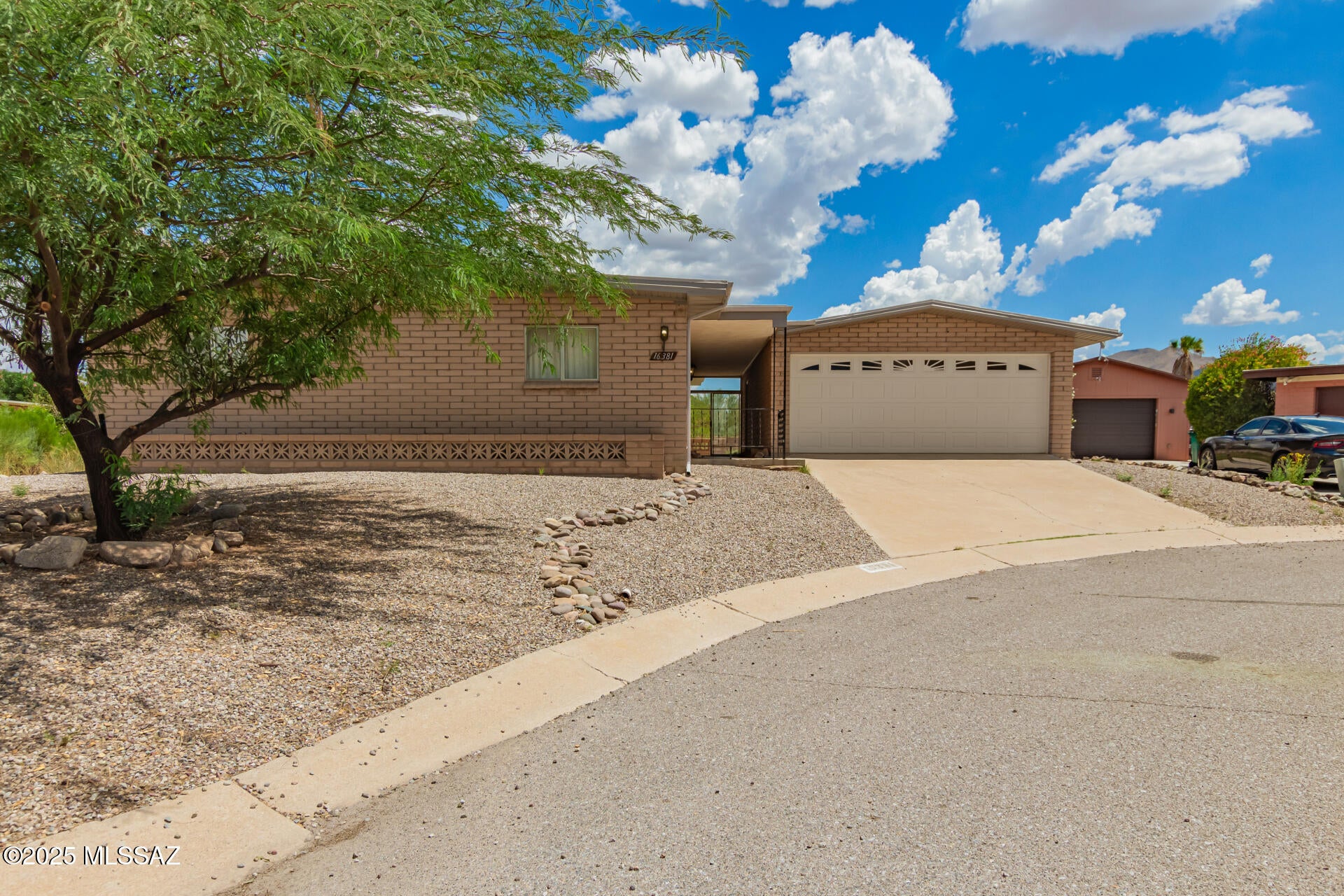 Beautiful 3 Bedroom, 2 Bathroom home in Corona de Tucson! Situated on a large lot in a cul-de-sac, this home offers over 1,700 square feet, an open floor plan, dining area, and a country kitchen with breakfast bar. Enjoy uninterrupted views of the Santa Rita Mountains, a large covered patio, and desert terrain right beyond your block wall. With a large 2-car garage and space for a motorhome or trailer, this home has plenty of space for the family or all of your toys. Central AC, gas, easy access to nature and great restaurants, and the highly desirable Vail School District. This home has a lot to offer. Come discover the possibilities in Corona de Tucson!