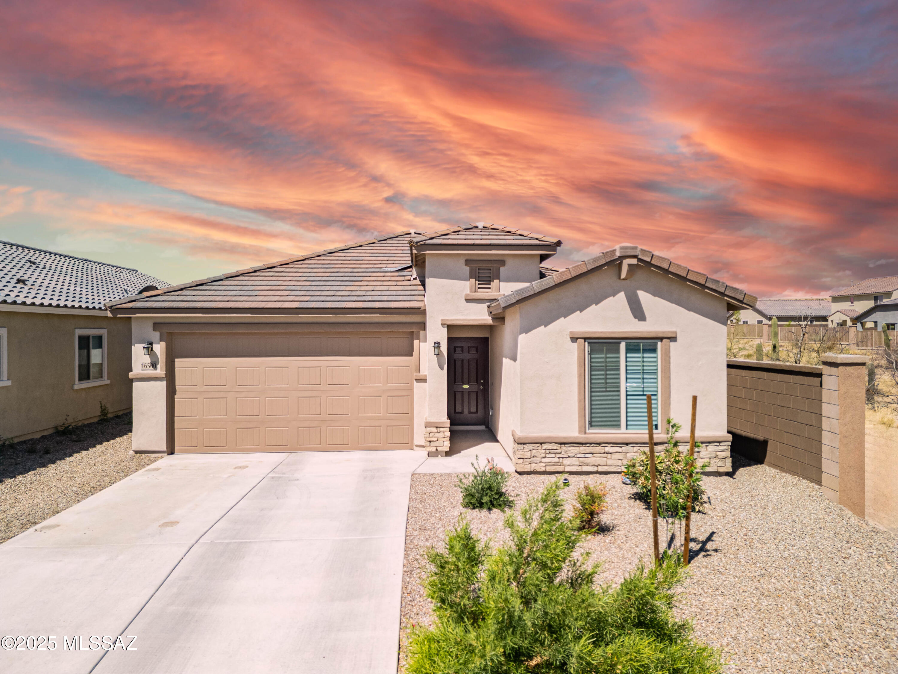 FINALLY!  The search is over!  Welcome home to your almost brand new, 4-bedroom plus den, 2 bathroom, 1915 sqft, single story CORNER LOT at the end of a private cul-de-sac!  This well-constructed home on a quiet street provides a view fence with desert open space and no neighbors behind!  This energy efficient home boasts a beautiful kitchen with large walk-in pantry, tons of cabinet space, and all stainless appliances, including brand new gas range, (although electric hook ups are also available).  Large primary suite gives you massive walk-in closet and double vanity in bathroom.  Tankless water heater!  Ceiling fans in most rooms!  Overhead storage racks in garage!  All appliances stay, including refrigerator, washer, and dryer!  Transferrable termite warranty!  Beautiful desert willow tree recently planted in front yard! NO INTERIOR STEPS! Hardware installed for SimpliSafe activation by new owners! Why buy new when this turn-key, move-in ready home is waiting for YOU!