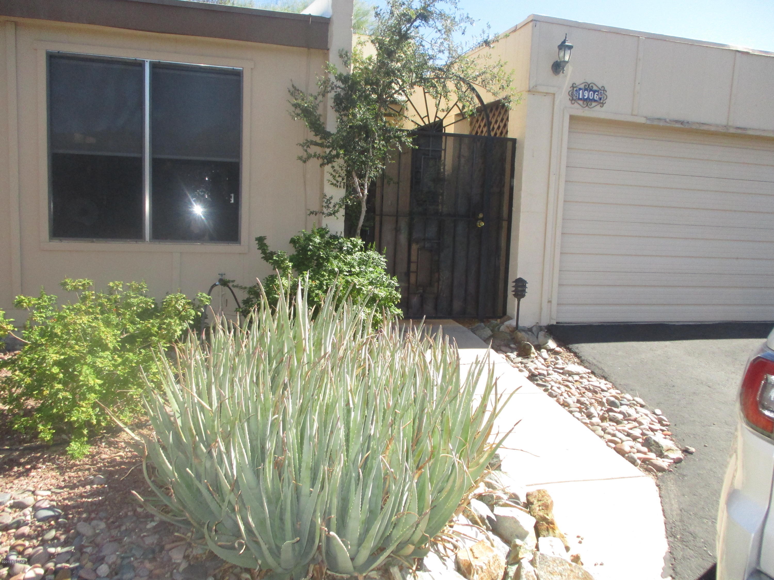 Excellent location!!! Large 3 bedroom, 2 bath. Lots of windows and very private patio/yard. Tons of kitchen cabinets and all appliances including washer & dryer!  New paint & new tile flooring. Nice paint color scheme to Satisfy. Community pool to enjoy. Ready to go.........